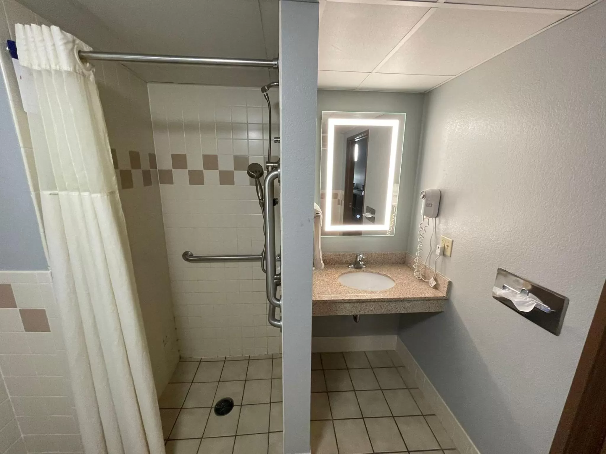 Bathroom in AmericInn by Wyndham Sayre