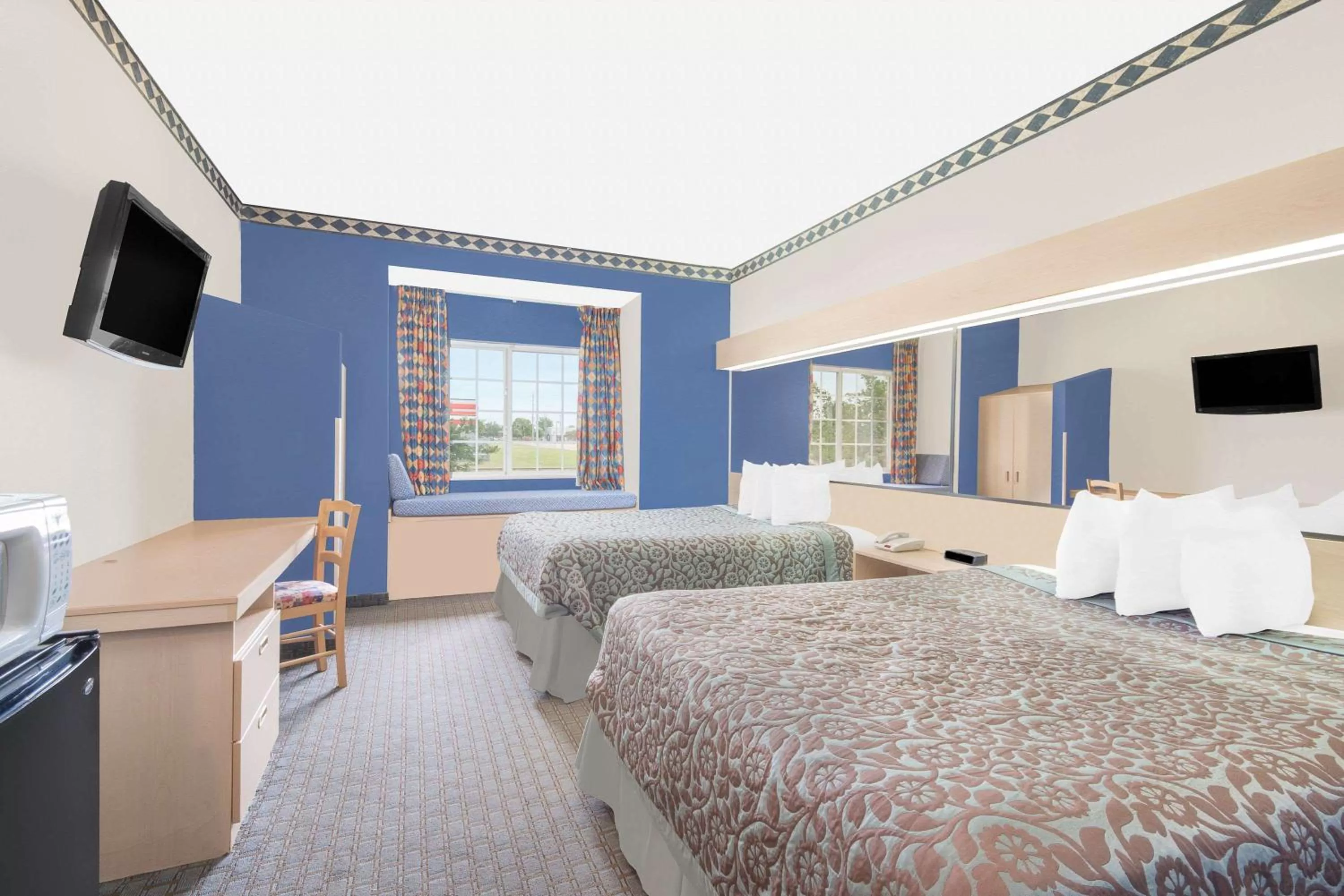 Photo of the whole room, Bed in Days Inn & Suites by Wyndham Hutchinson