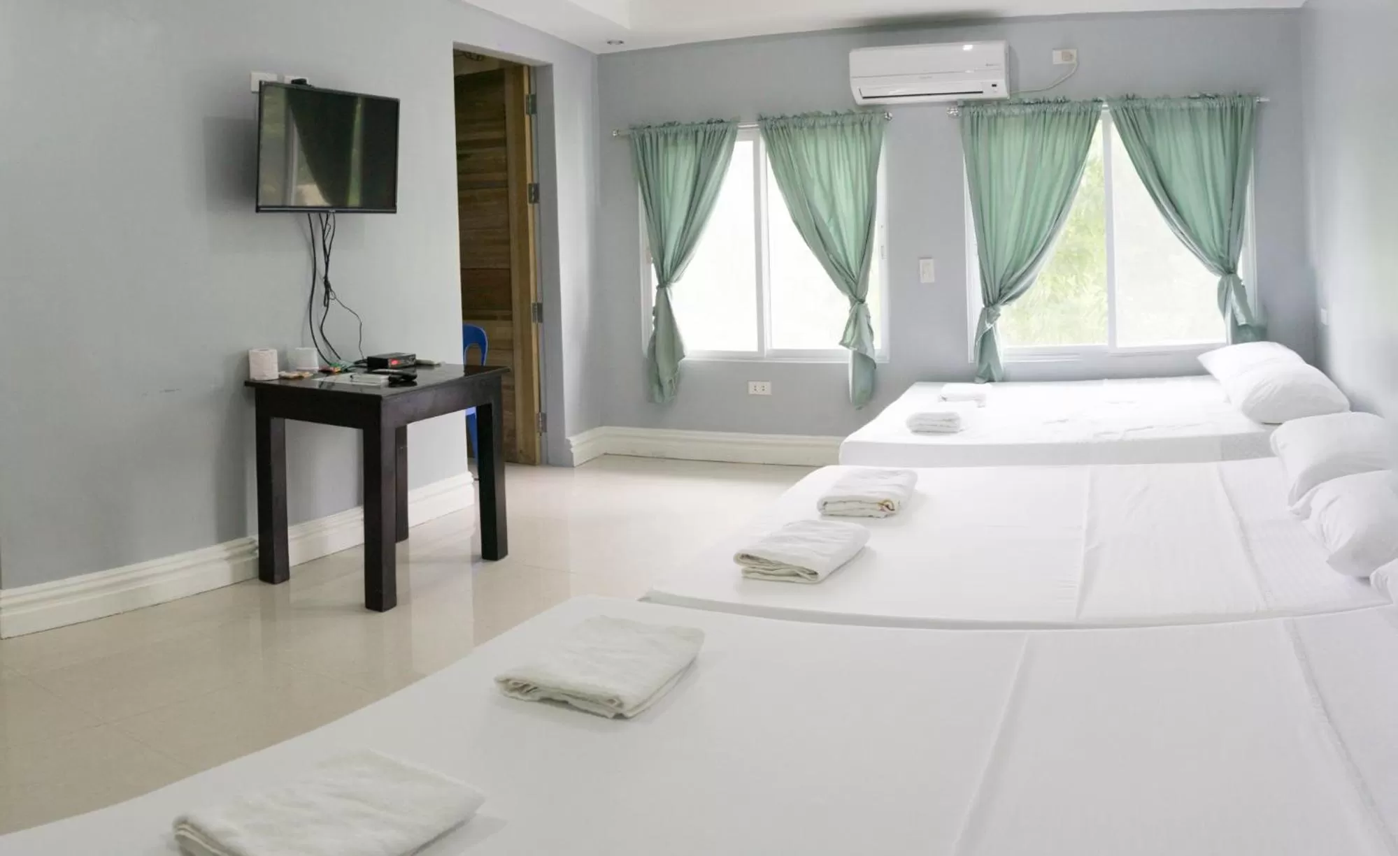 Bed in Sandscape Hotel
