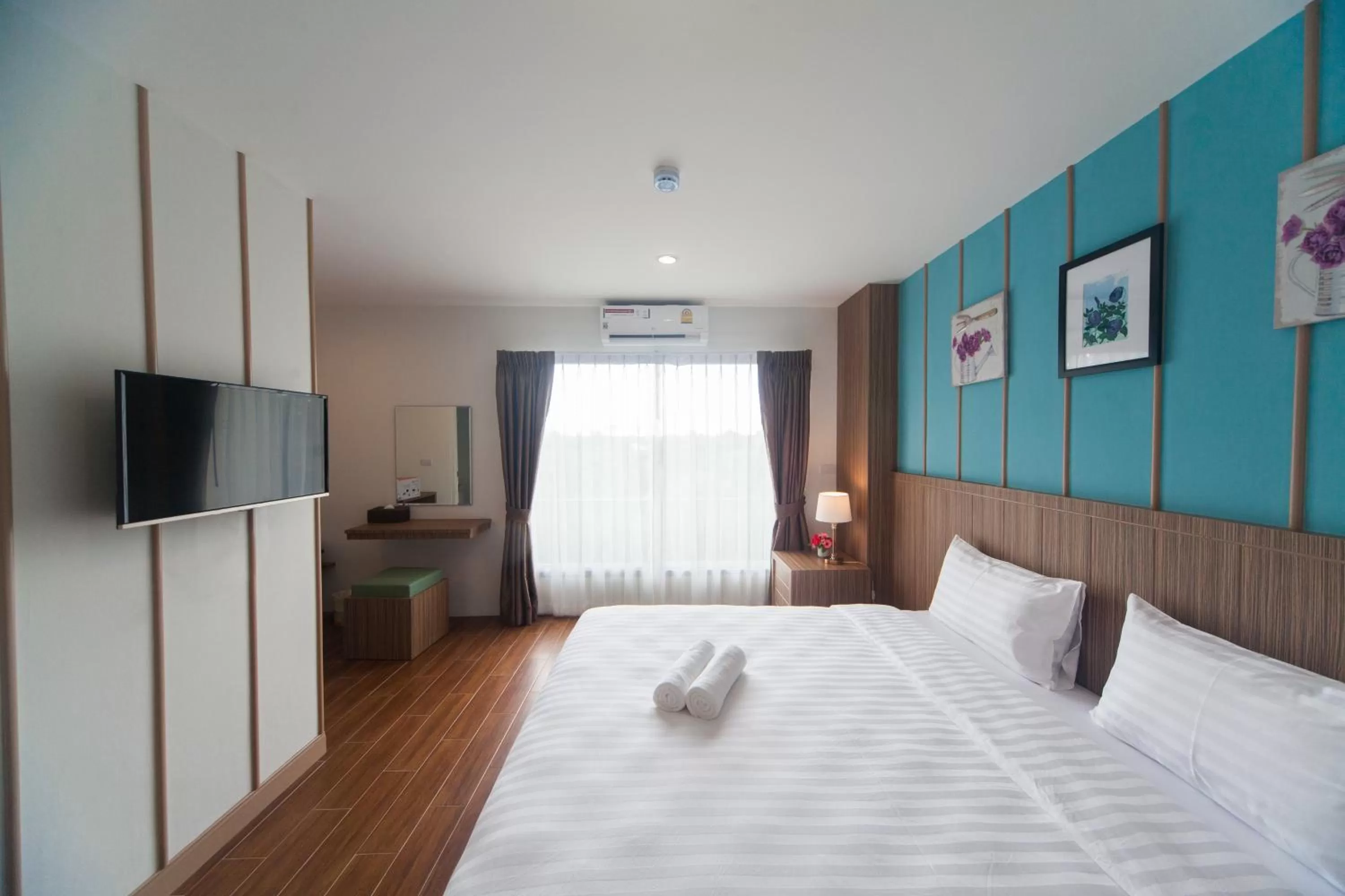 Bedroom, Bed in Anchan Laguna Hotel โรงแรมอัญชันลากูน่า