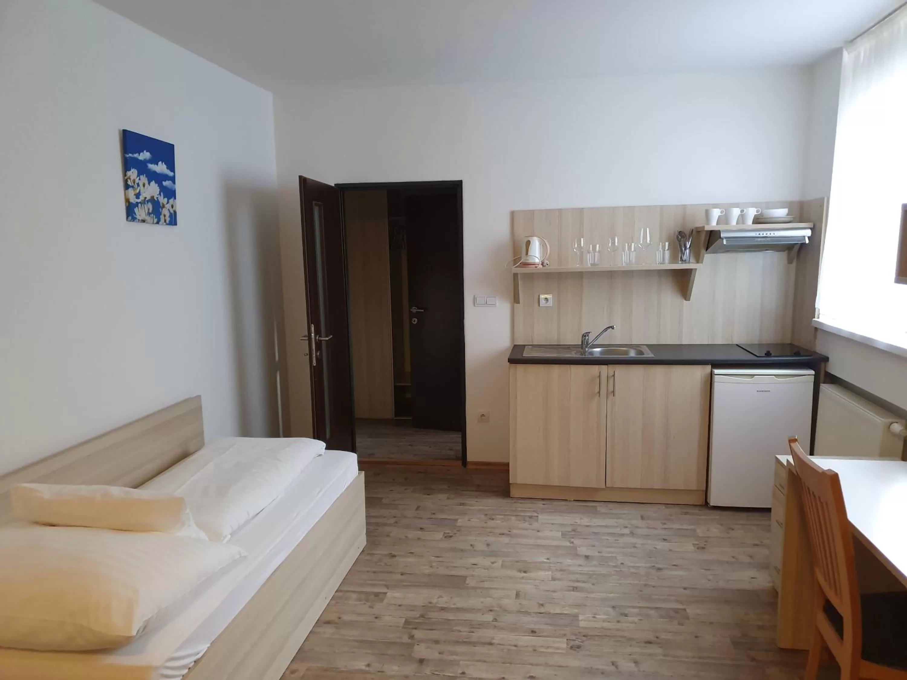 Kitchen or kitchenette, Bed in Hotel Palác