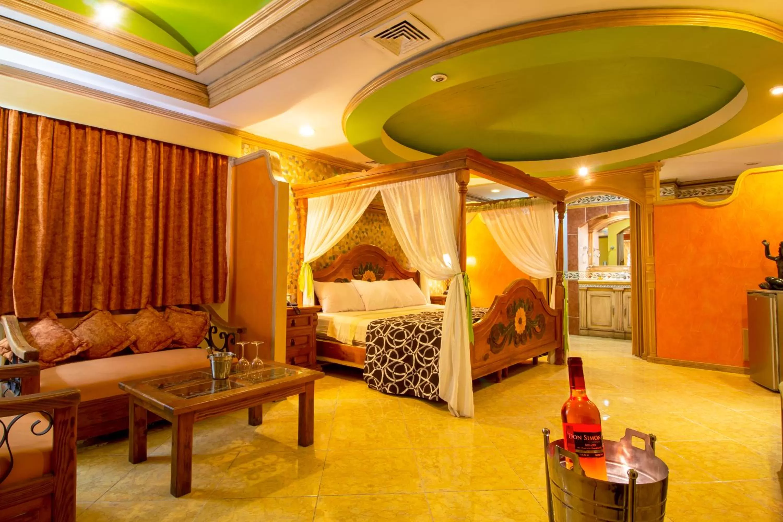 Photo of the whole room, Bed in Suites Flamboyanes