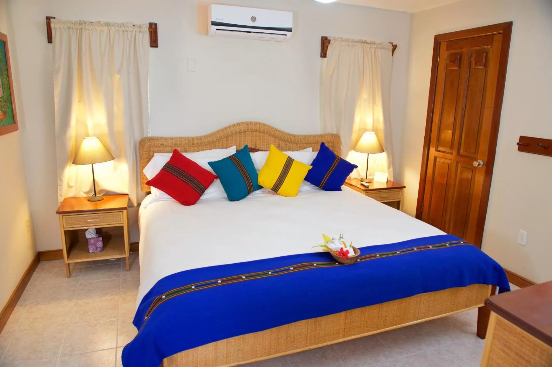 Bed in The Palms Oceanfront Suites