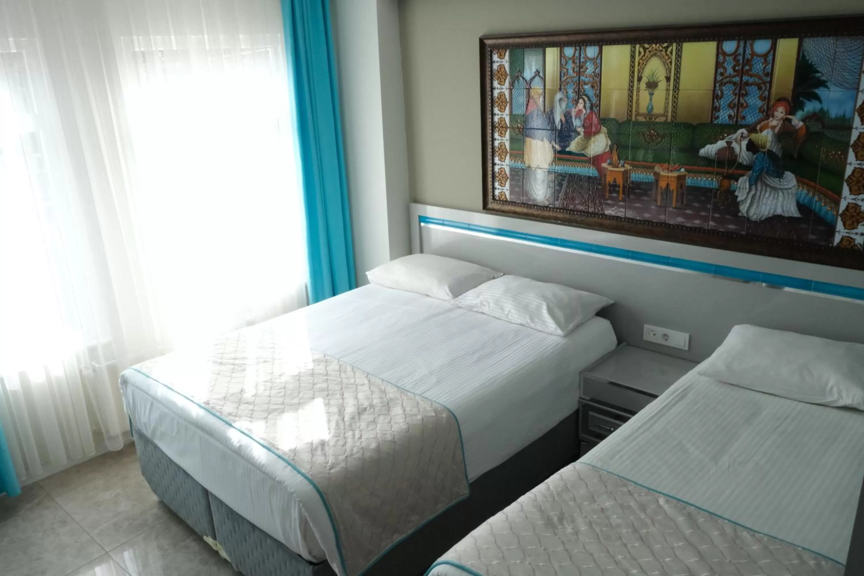 Bed in Star Holiday Hotel