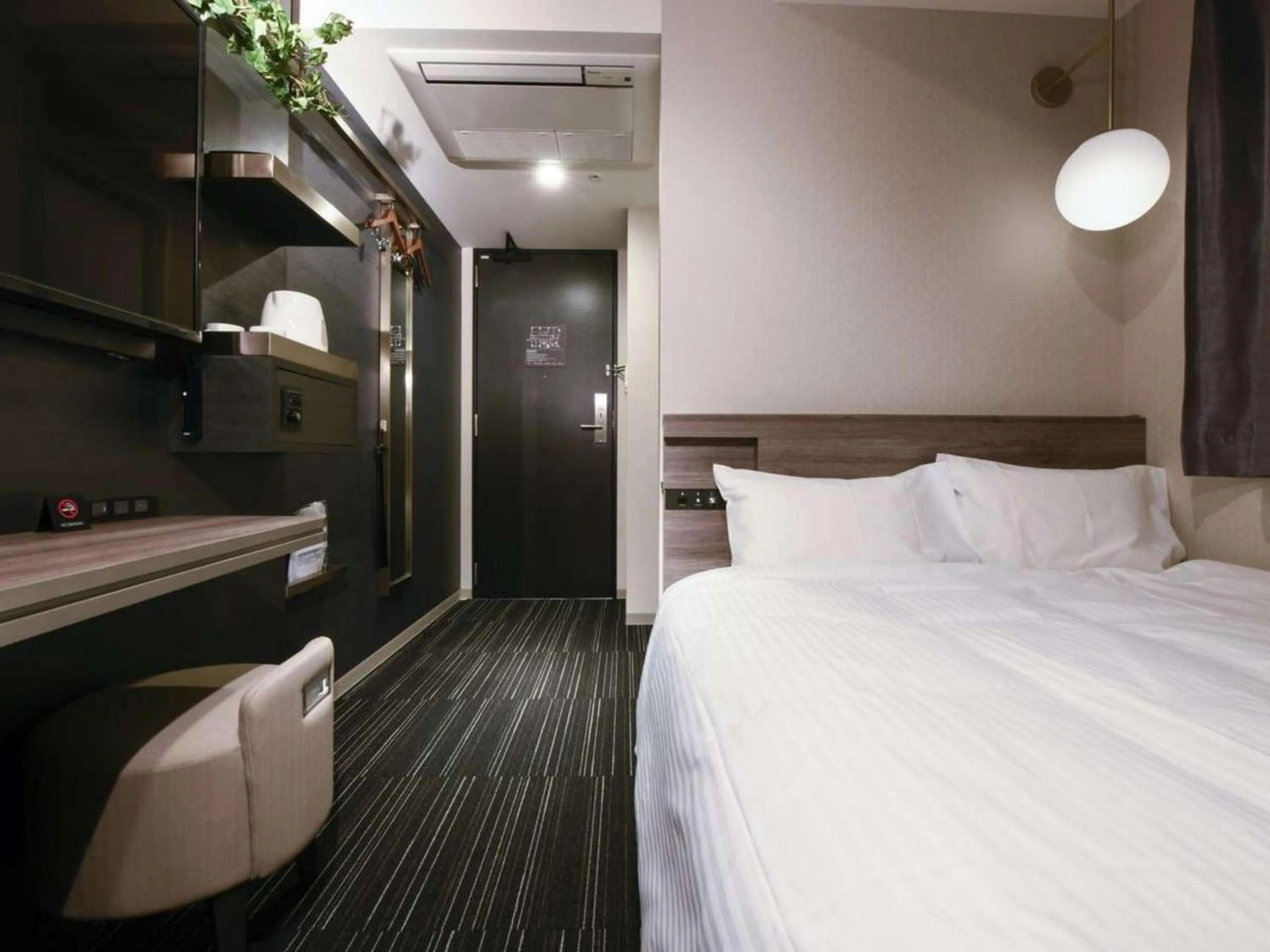 Bed in Henn na Hotel Tokyo Hamamatsucho