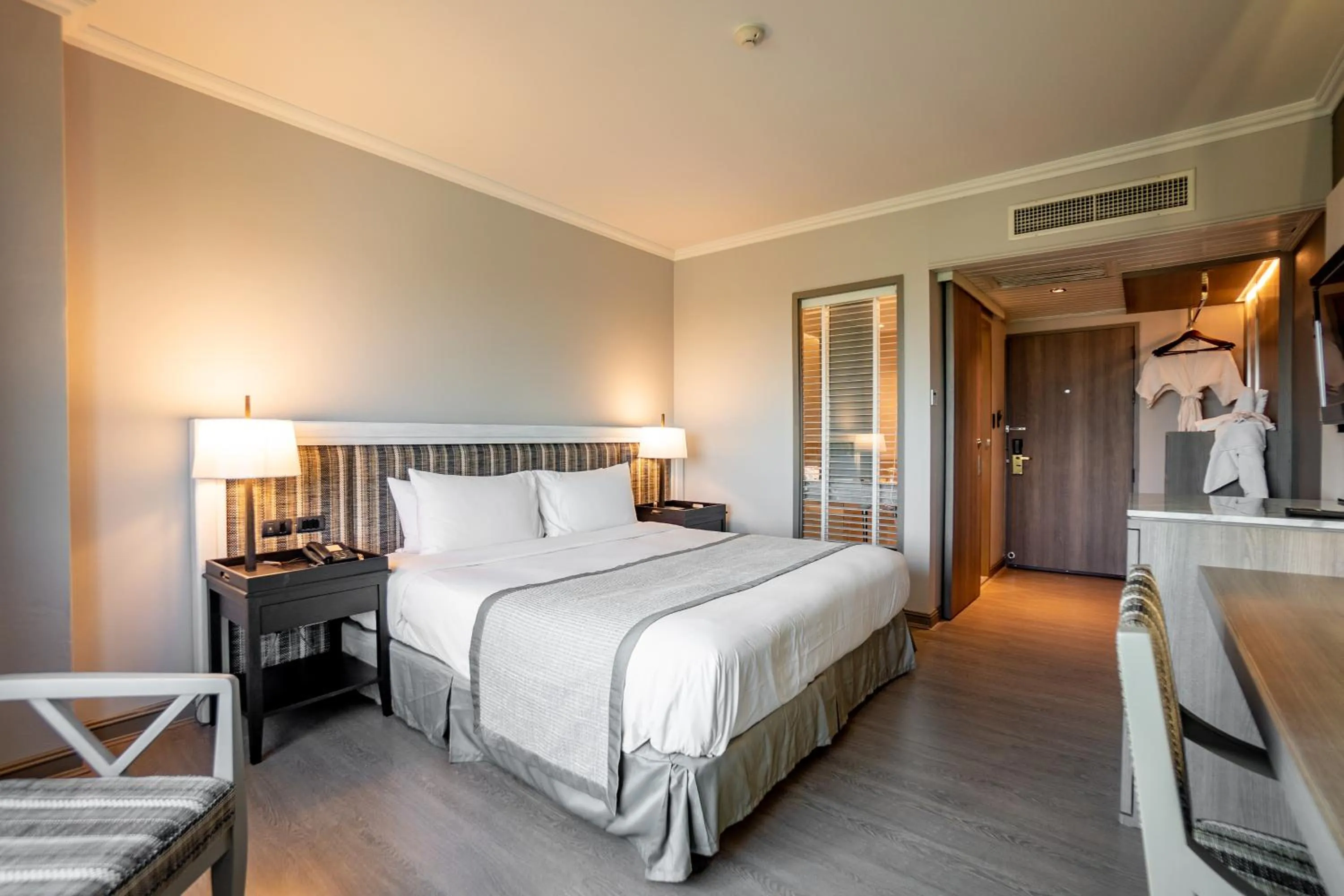 Bed in The Grand Riverside Hotel