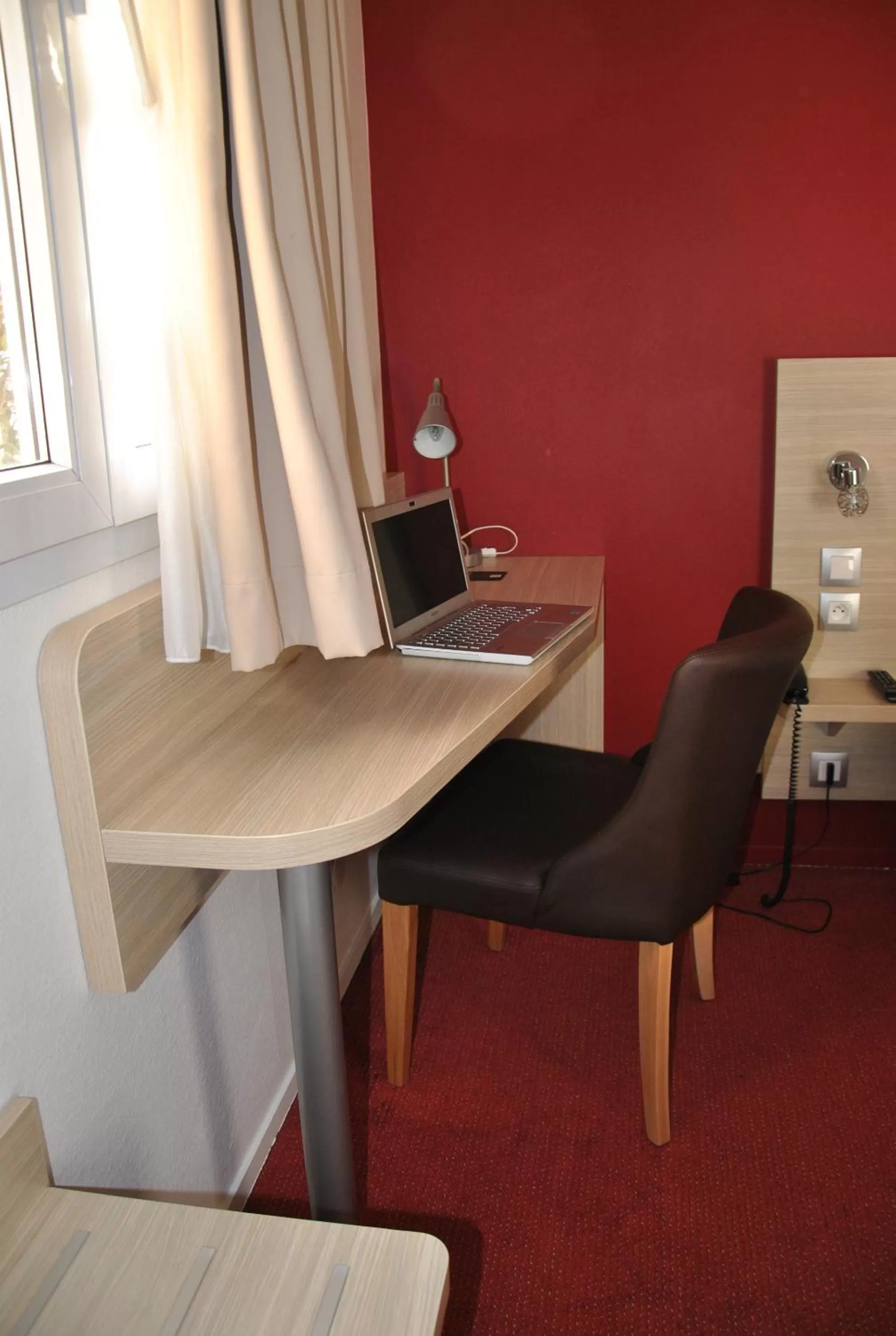 Bedroom in Logis Hotel Altina