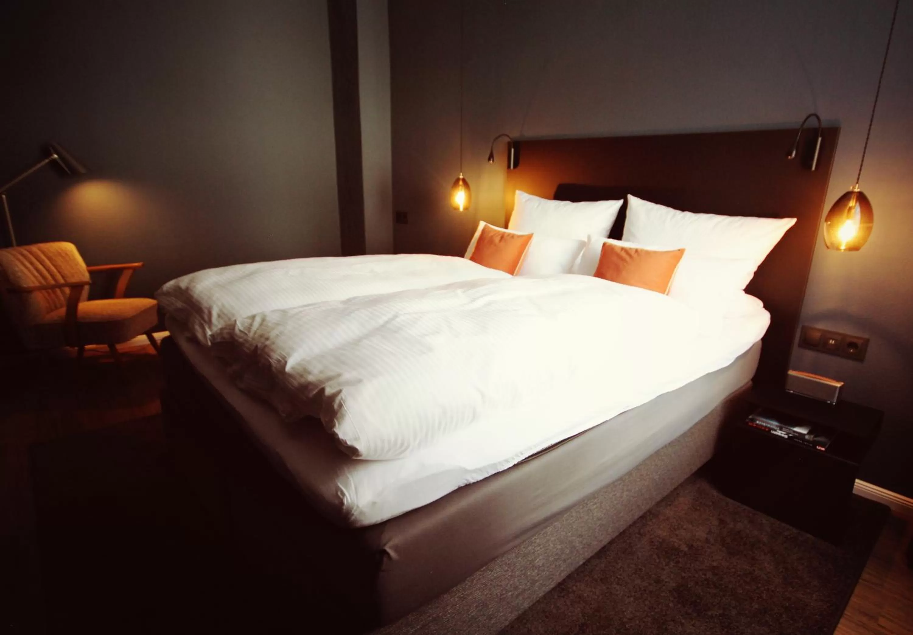 Bed in ONNO Boutique Hotel & Apartments