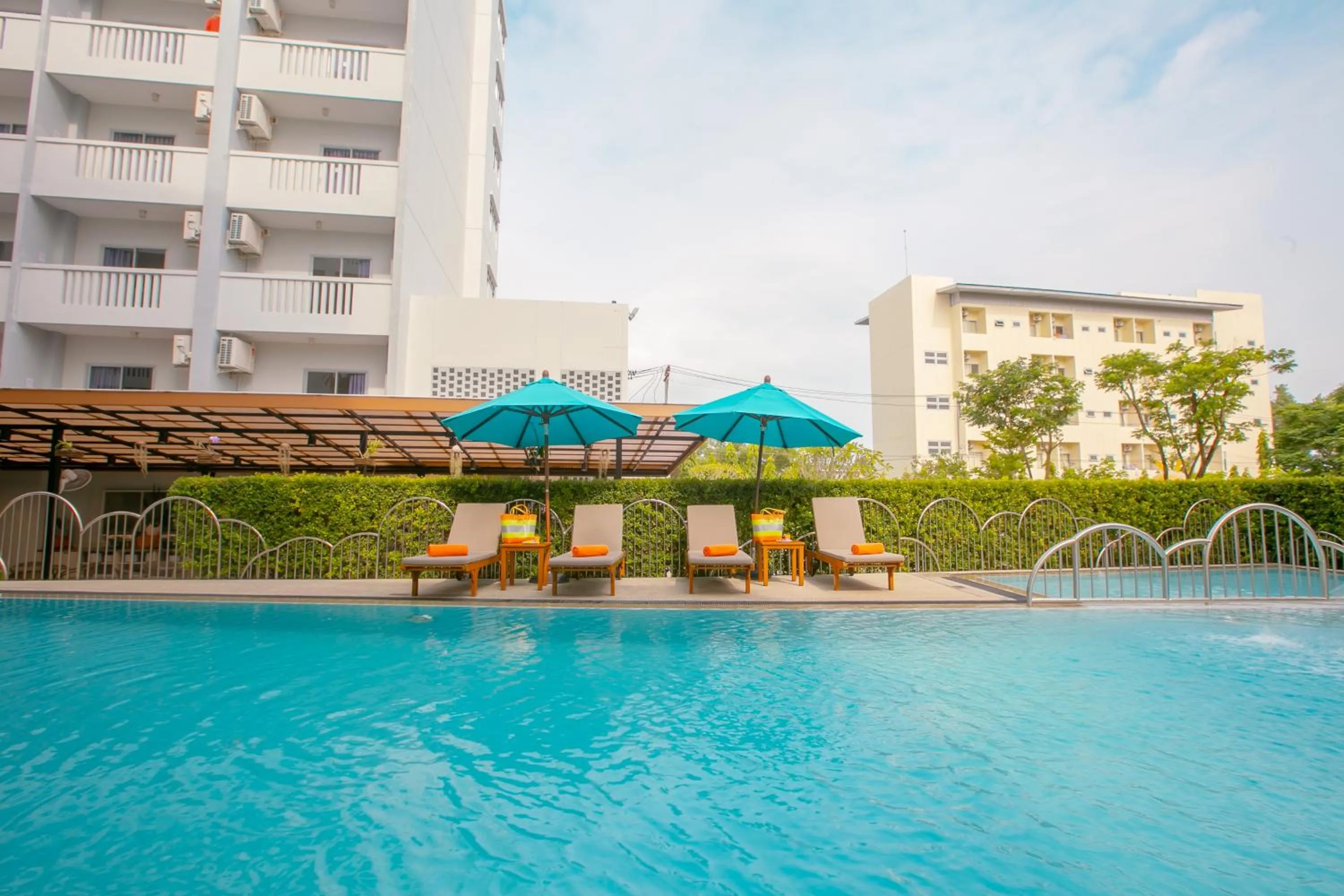 Swimming pool in Recenta Phuket Suanluang by Deevana