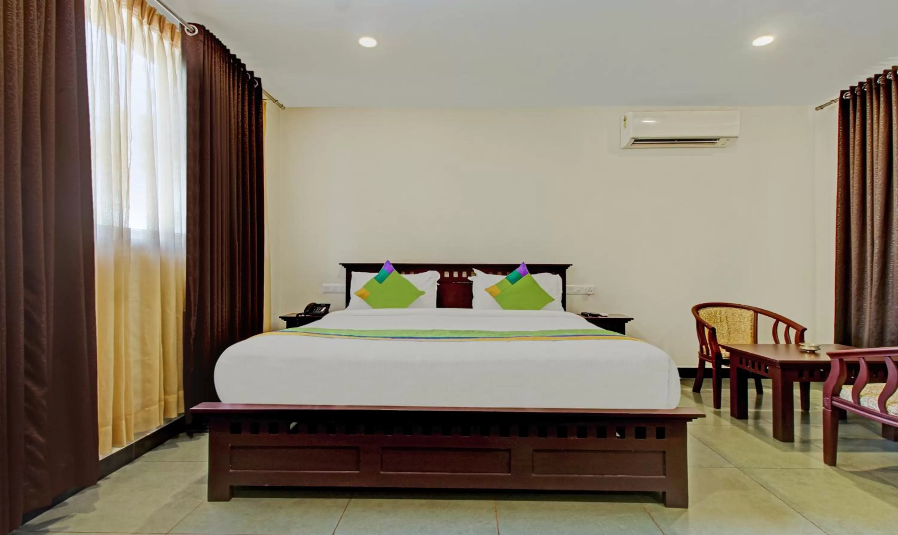 Bedroom, Bed in Treebo Prince