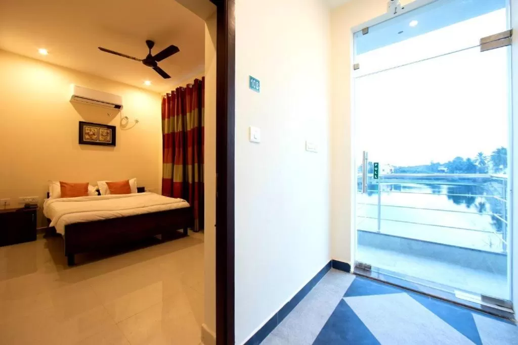 Photo of the whole room, Bed in Thiru Pavilion Retreat