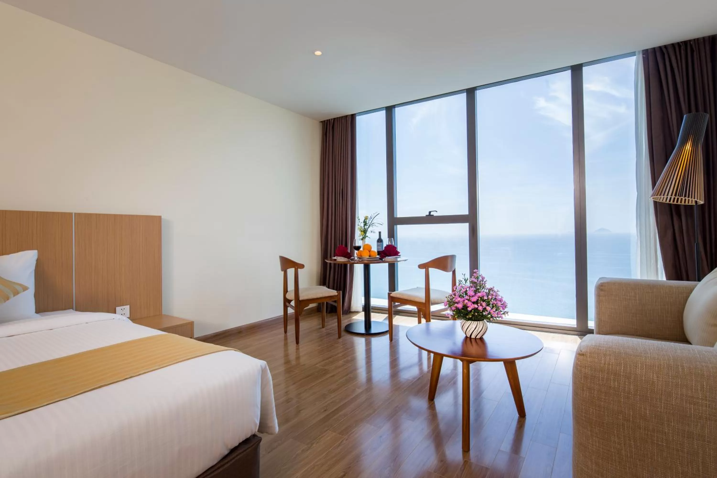 Seating area, Bed in Starcity Hotel & Condotel Beachfront Nha Trang