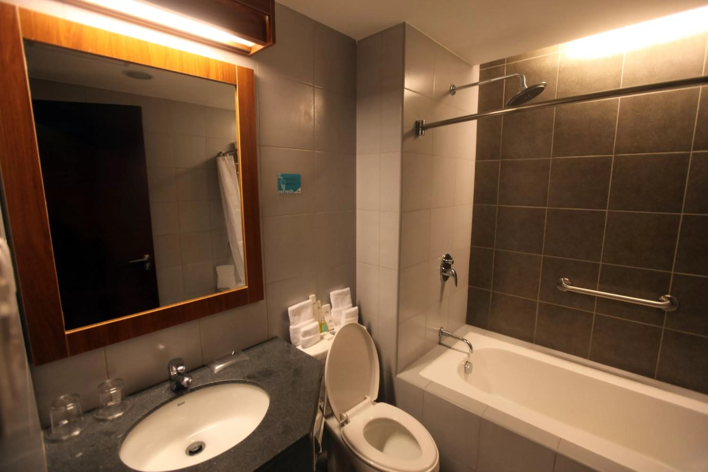 Toilet in Microtel by Wyndham UP Technohub