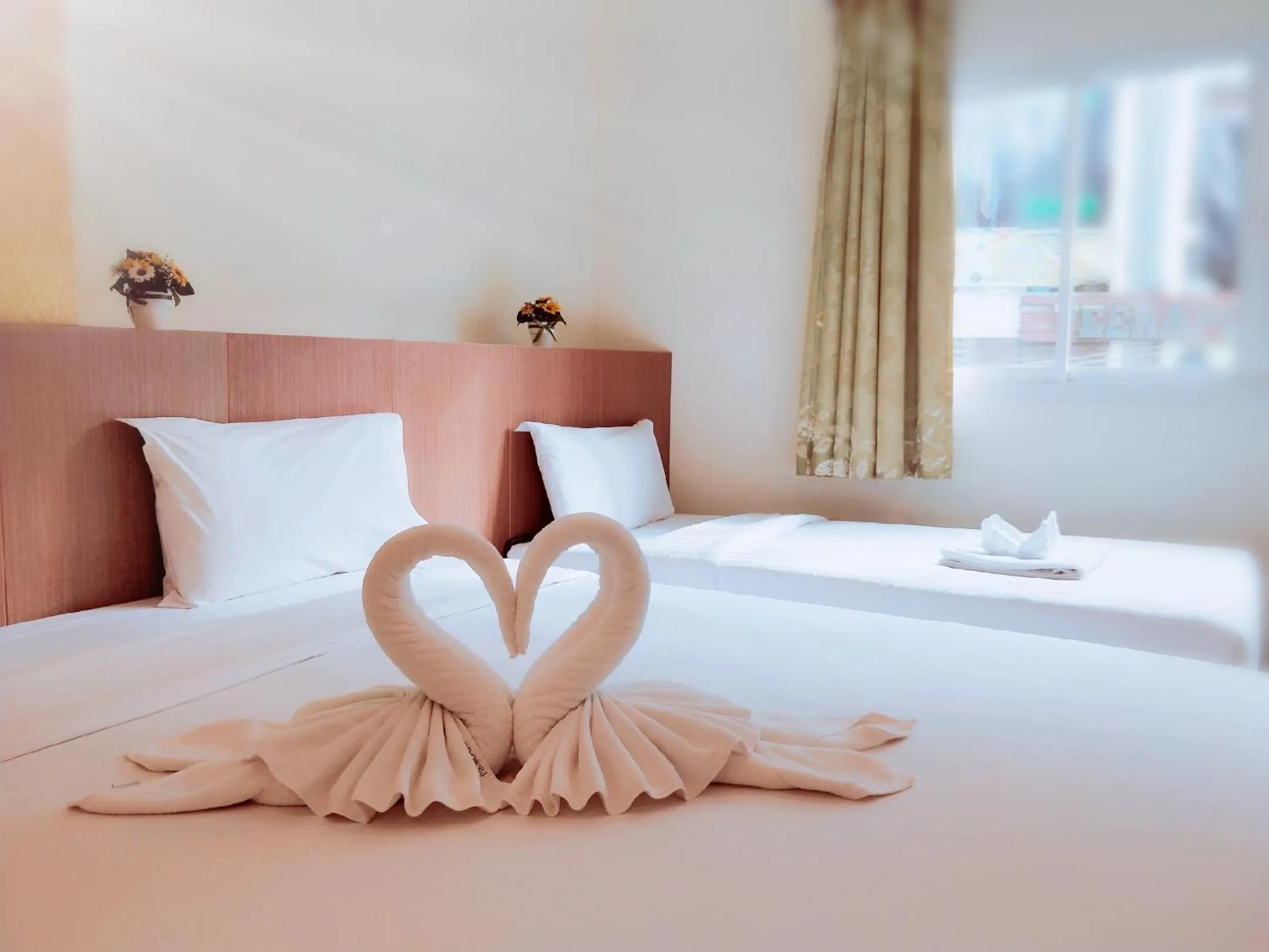 Bed in Pimrada Hotel