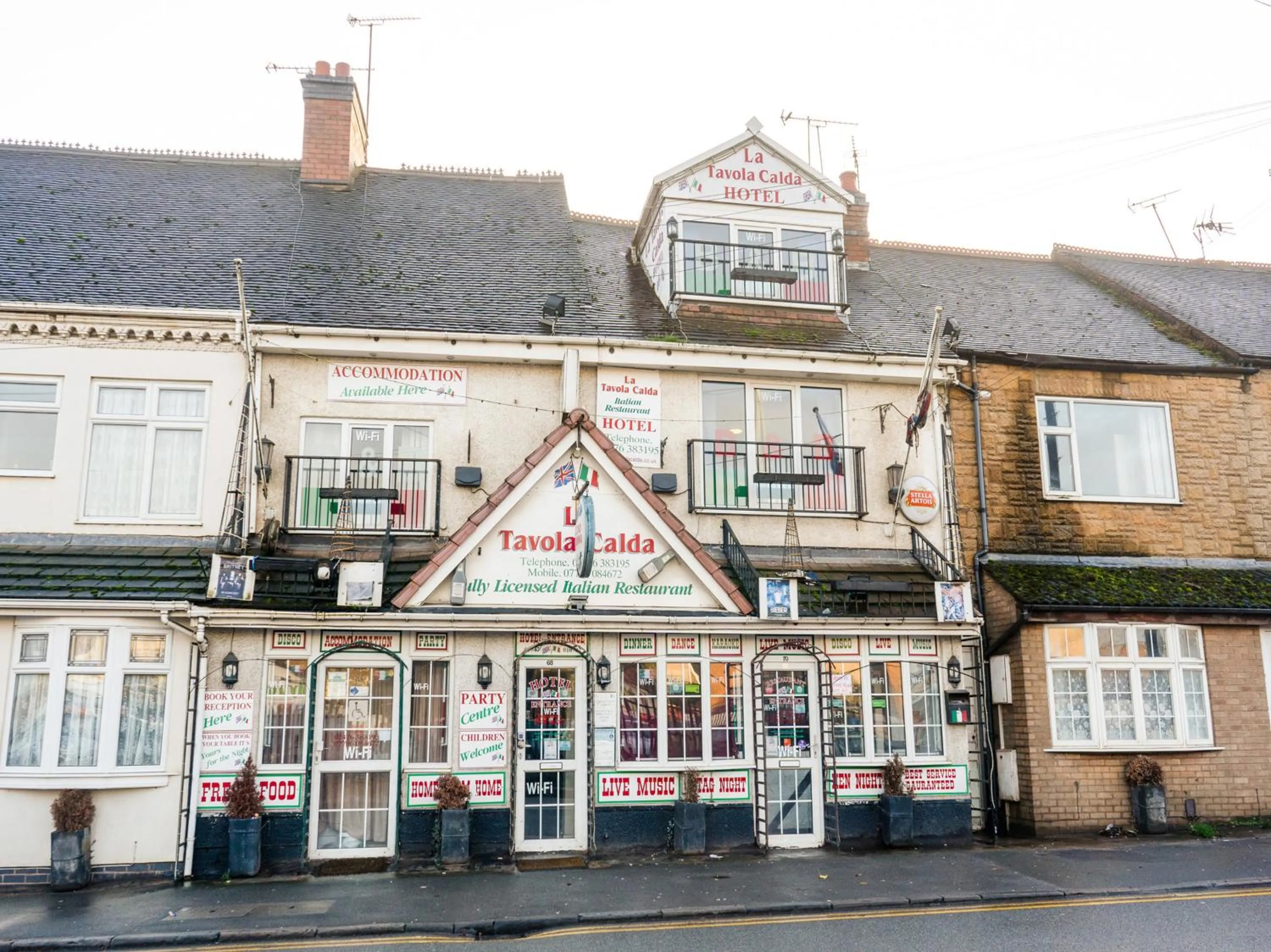 Facade/entrance in La Tavola Calda Hotel