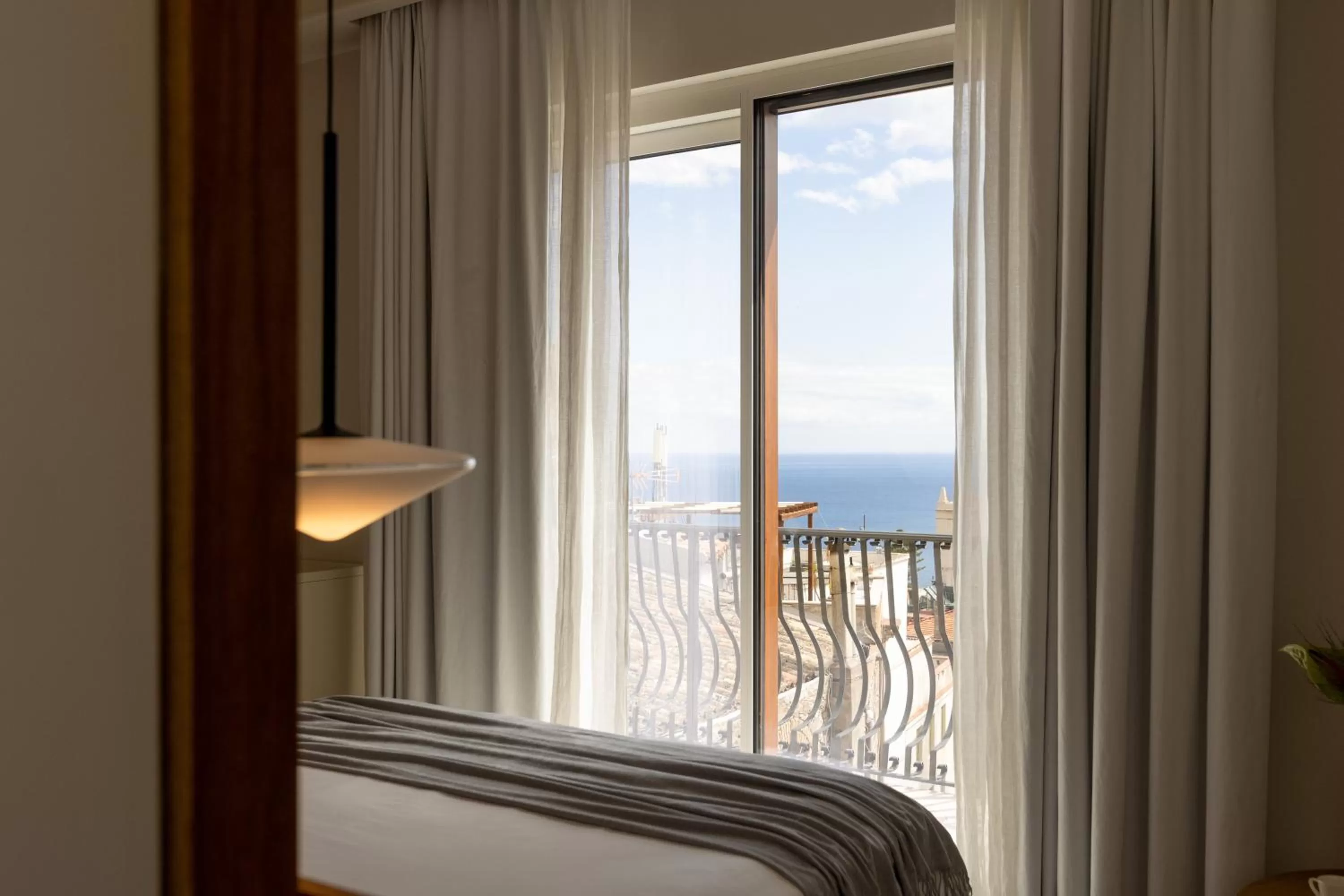 Bed in Taodomus Boutique Hotel