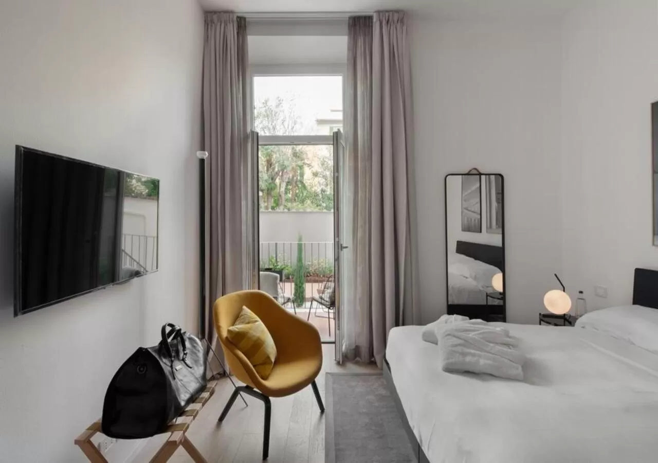 Bed in BB Hotels Aparthotel Collection Il Michelangelo