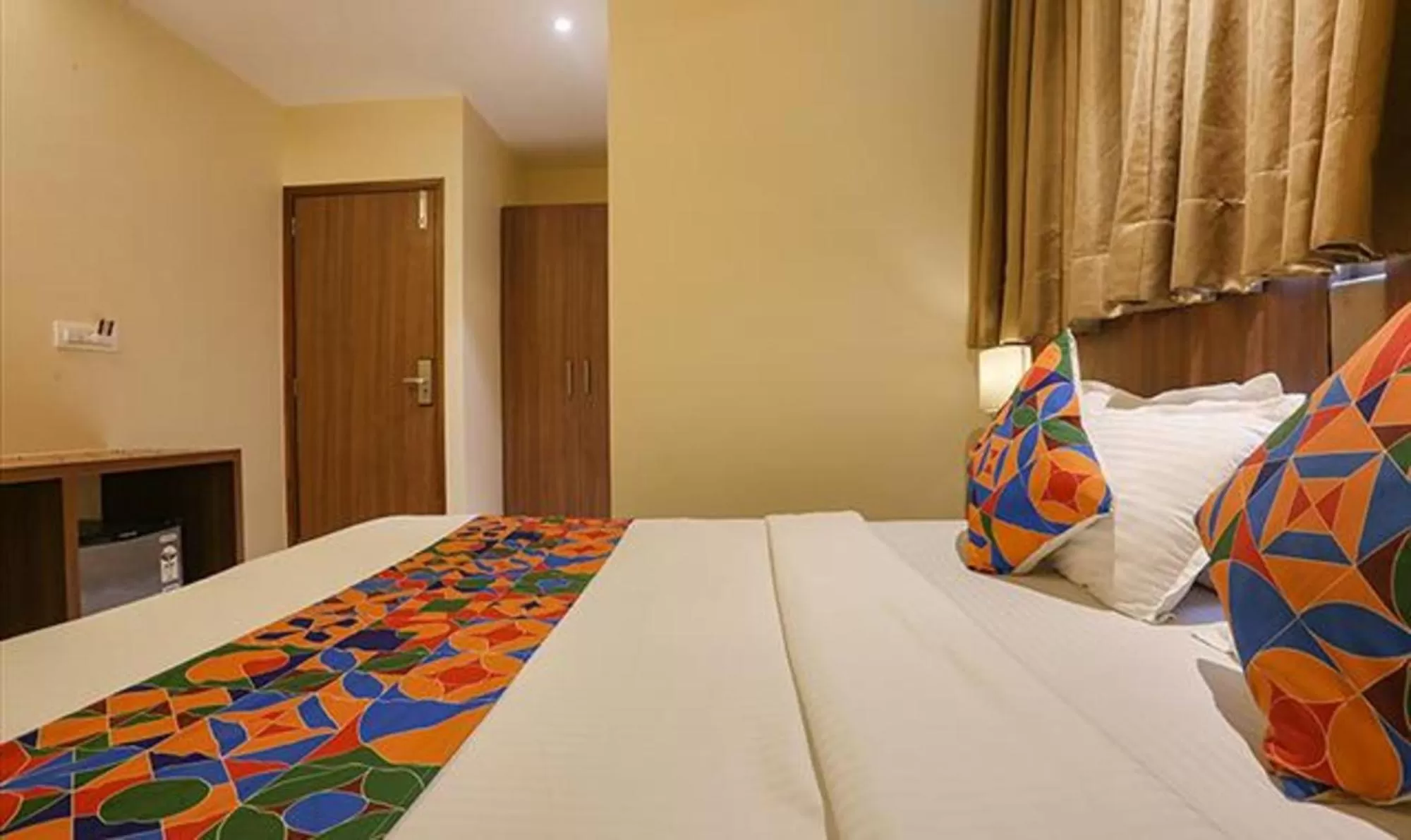 Bed in FabHotel Royal Mumbai International Airport