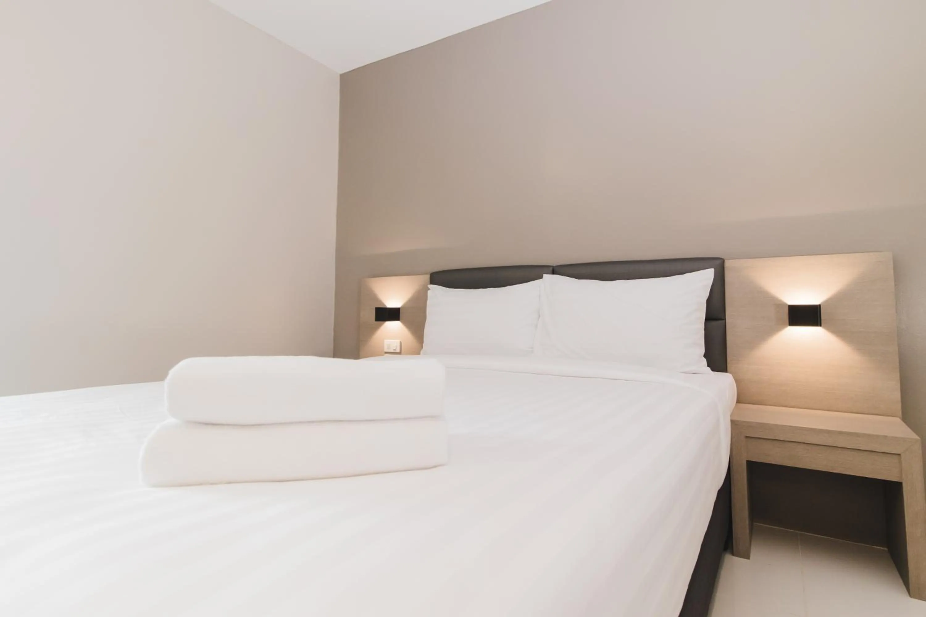 Bed in So good Hotel Bangkok