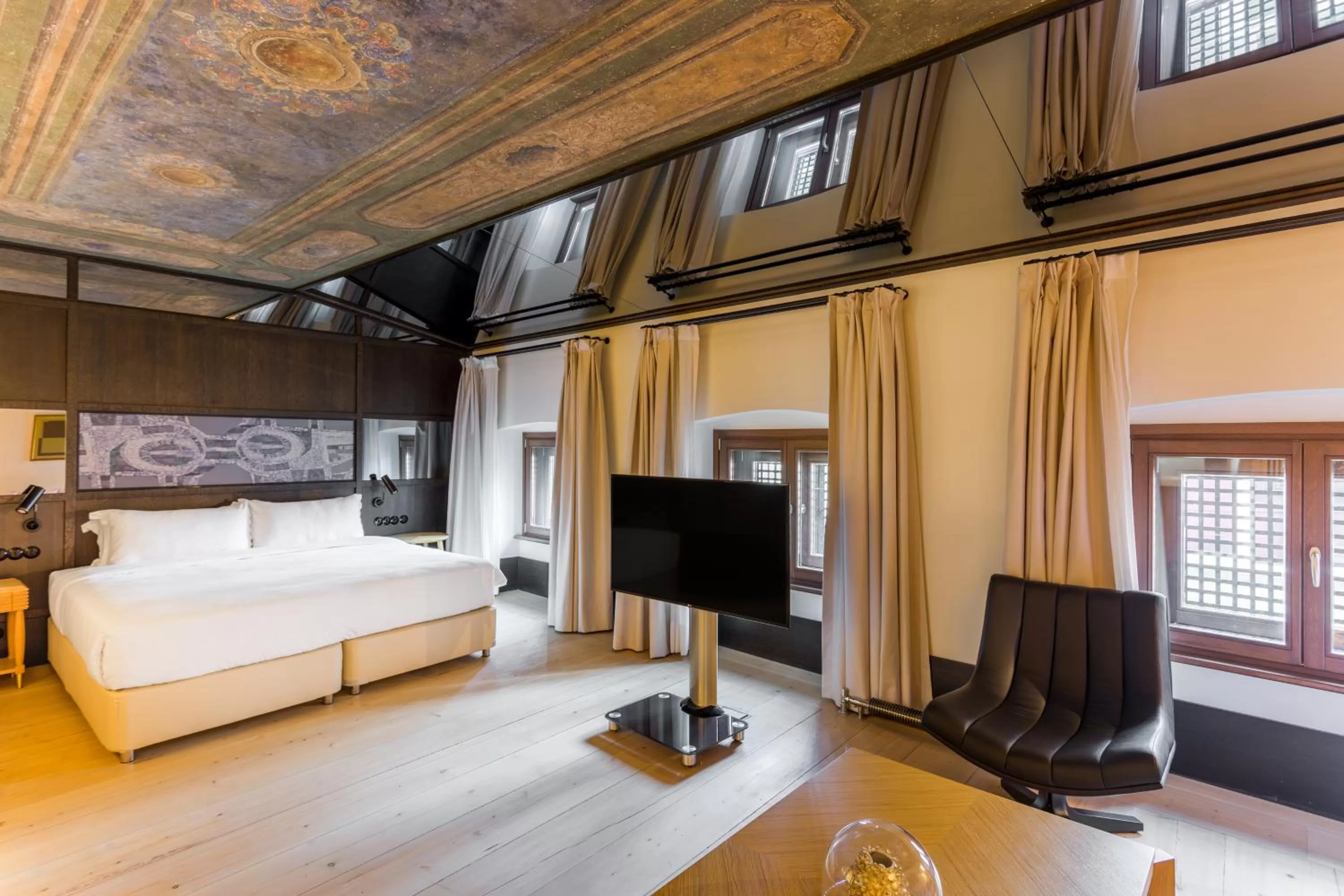 Bed in The Wings Hotels Collection