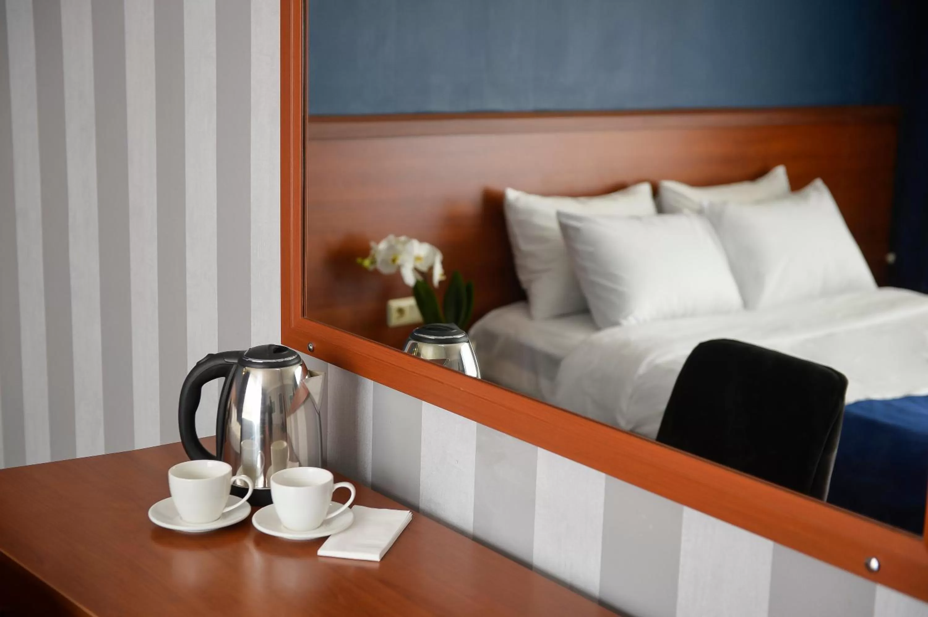 Bed in Aura Boutique Hotel