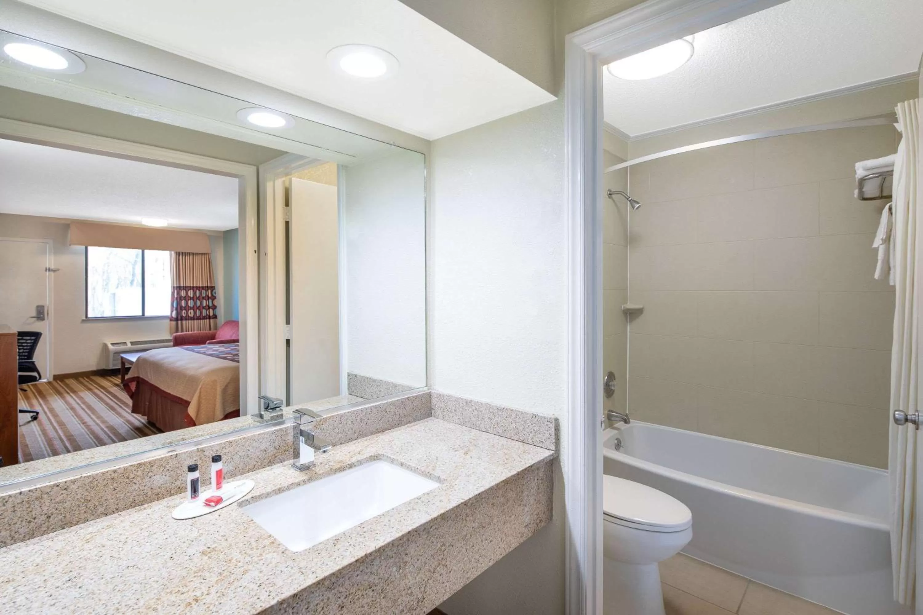 Bathroom in Super 8 by Wyndham Burlington NC