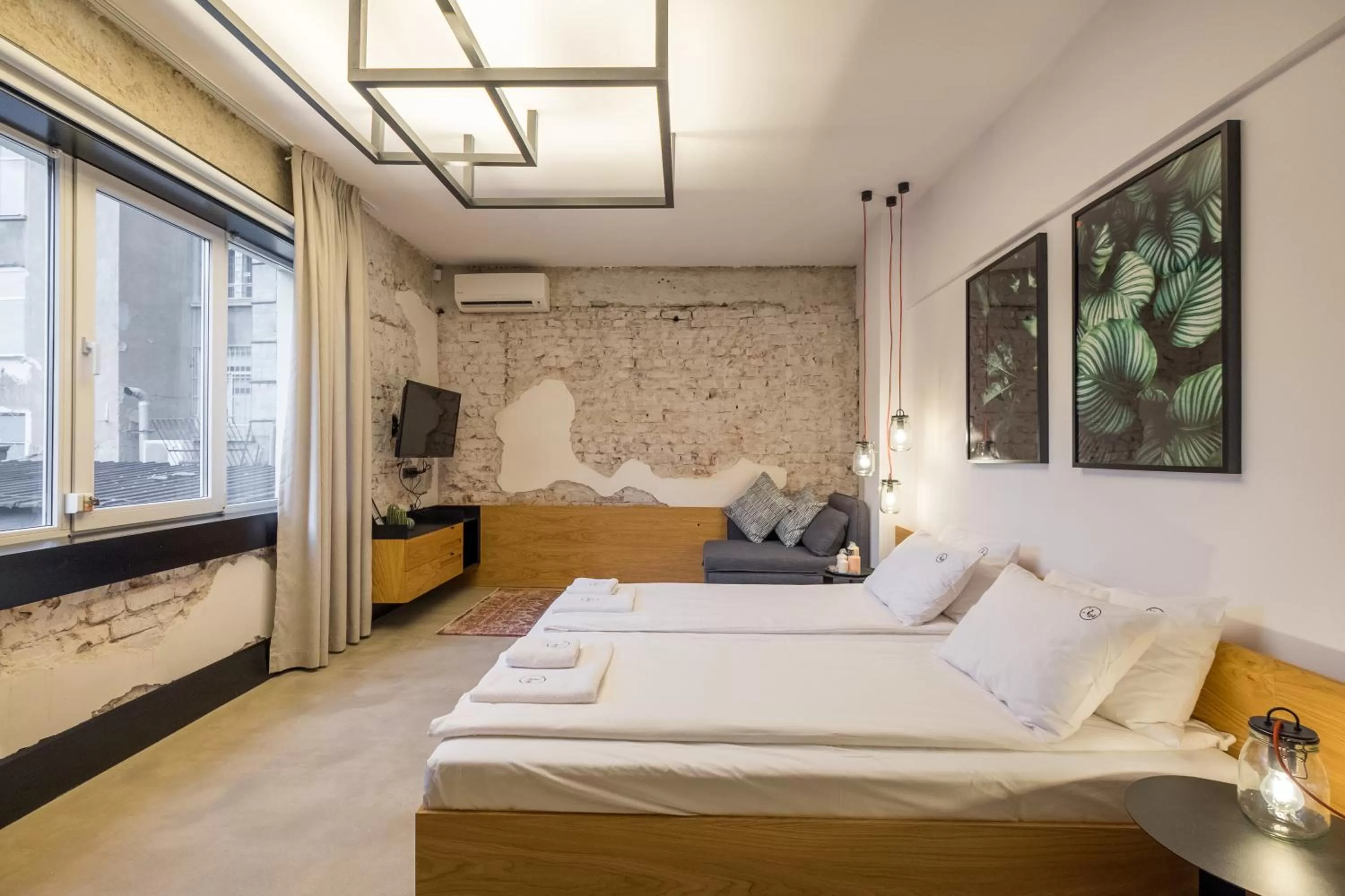 Bed in R34 Boutique Hotel