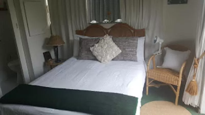 Bed in Forword's River Lodge