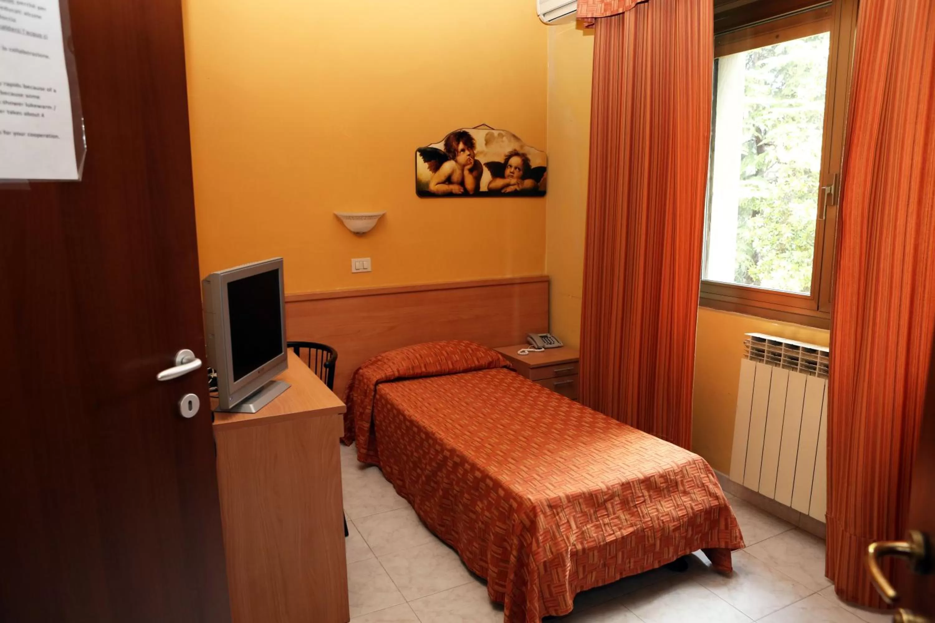 Bed in Hotel Bicocca