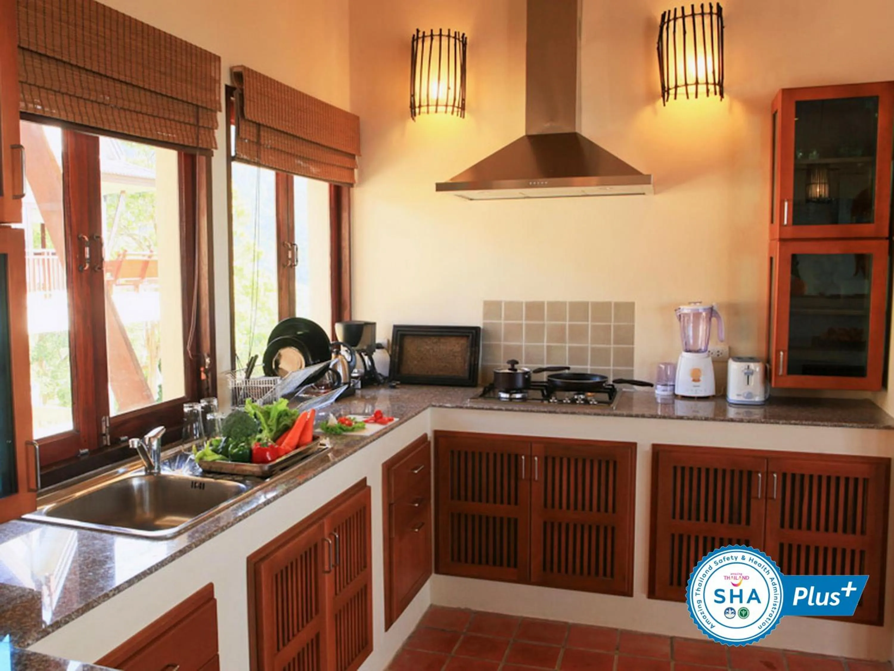 Kitchen or kitchenette in Baan KanTiang See Villas - SHA Extra Plus