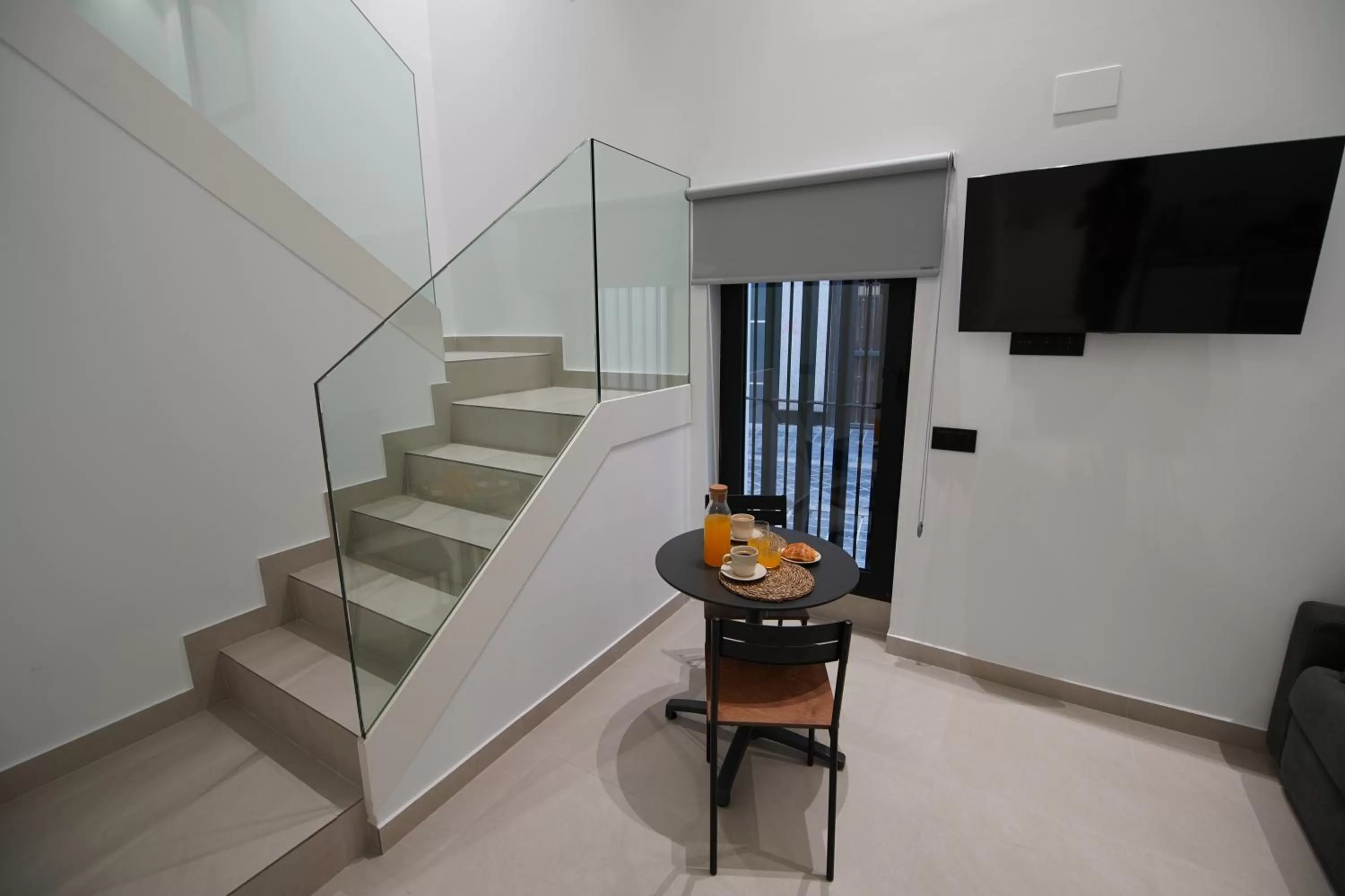 TV and multimedia in BET Apartments - Suites Puerto Valencia