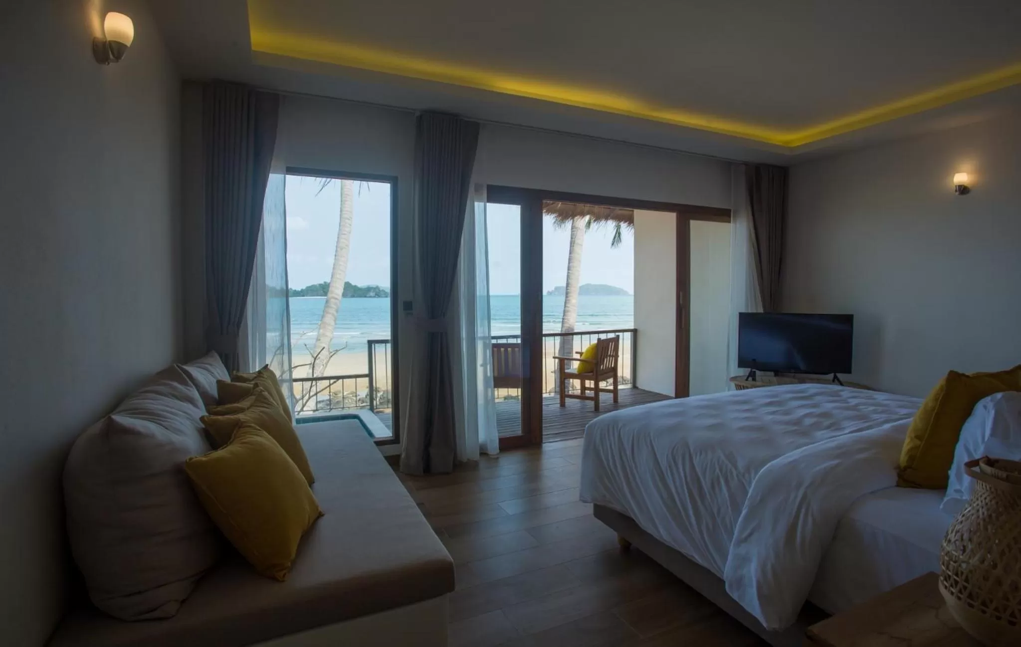 Bed in The Nest Private Beach Resort