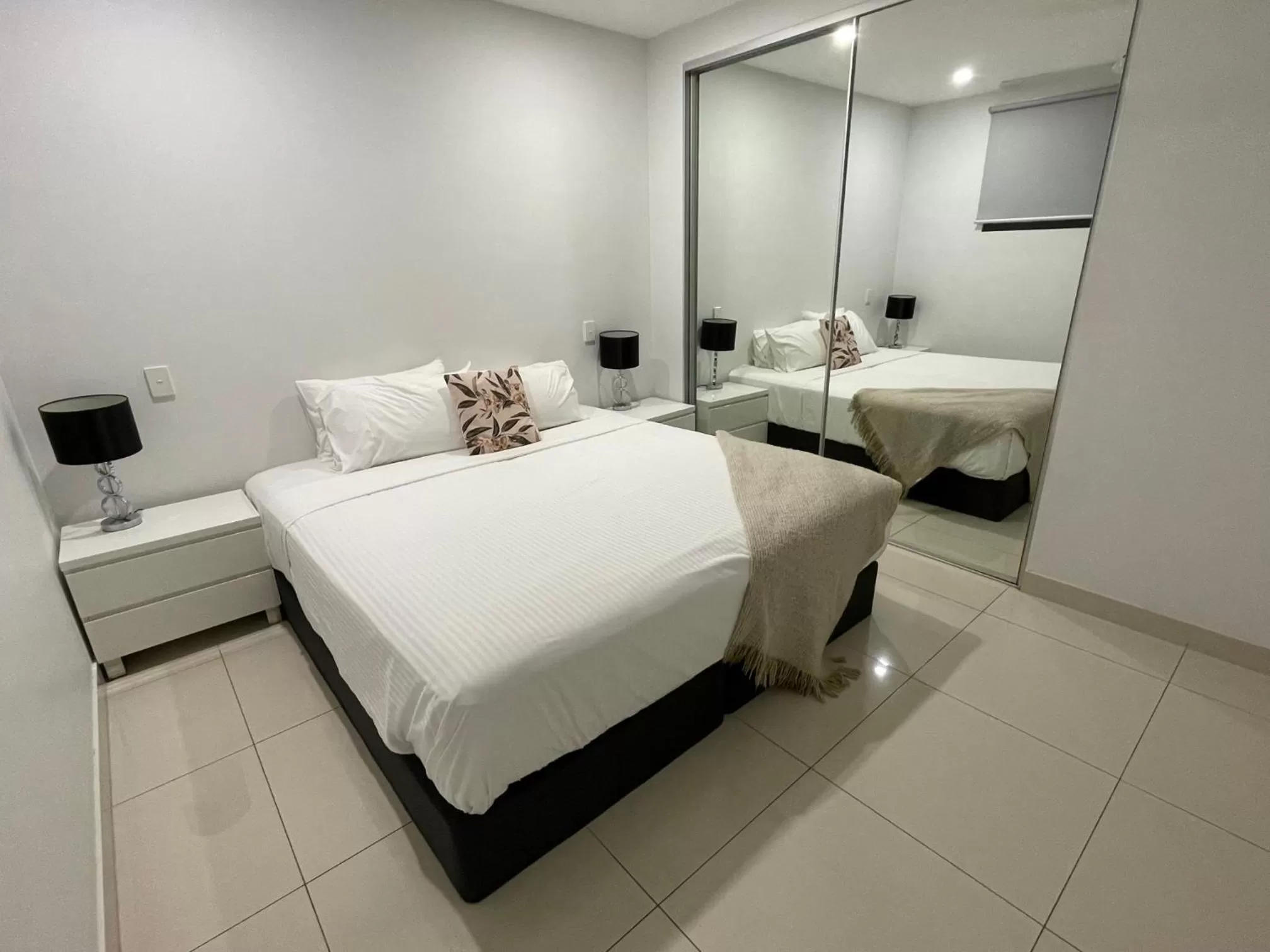 Bed in Magnum Serviced Apartments