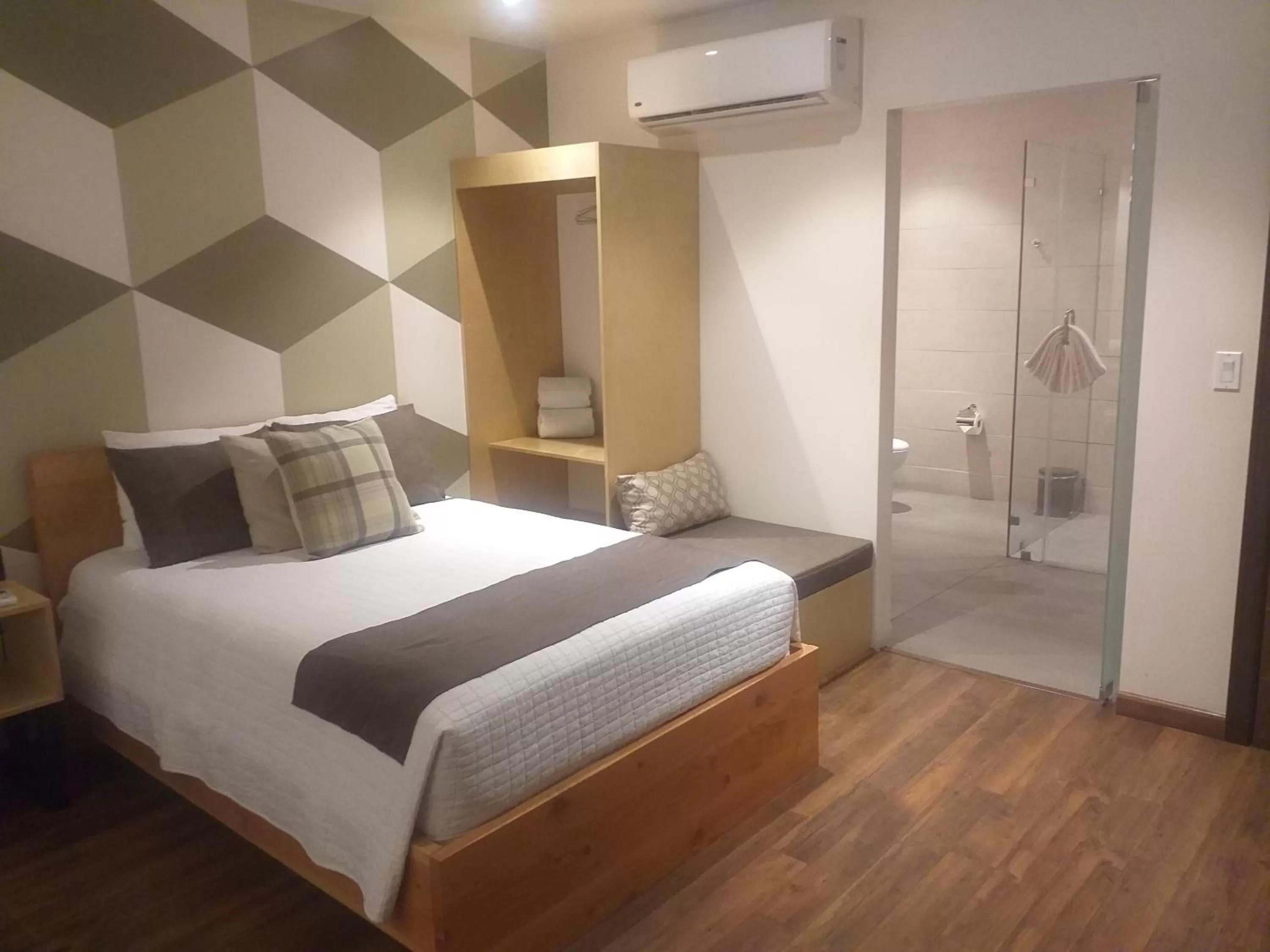 Bed in Alou Hotel Boutique