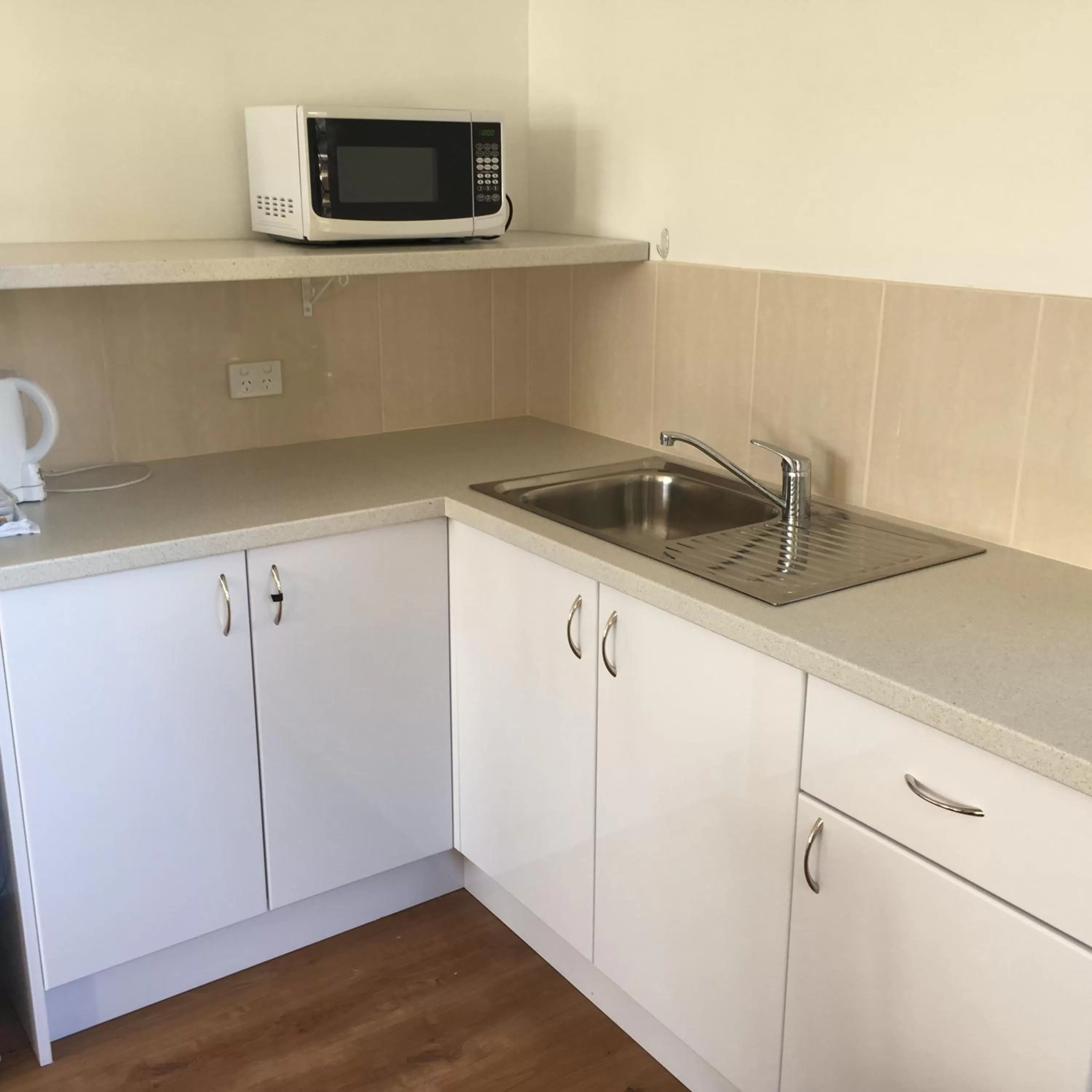 Kitchen or kitchenette in Forster and Wallis Lake Motel