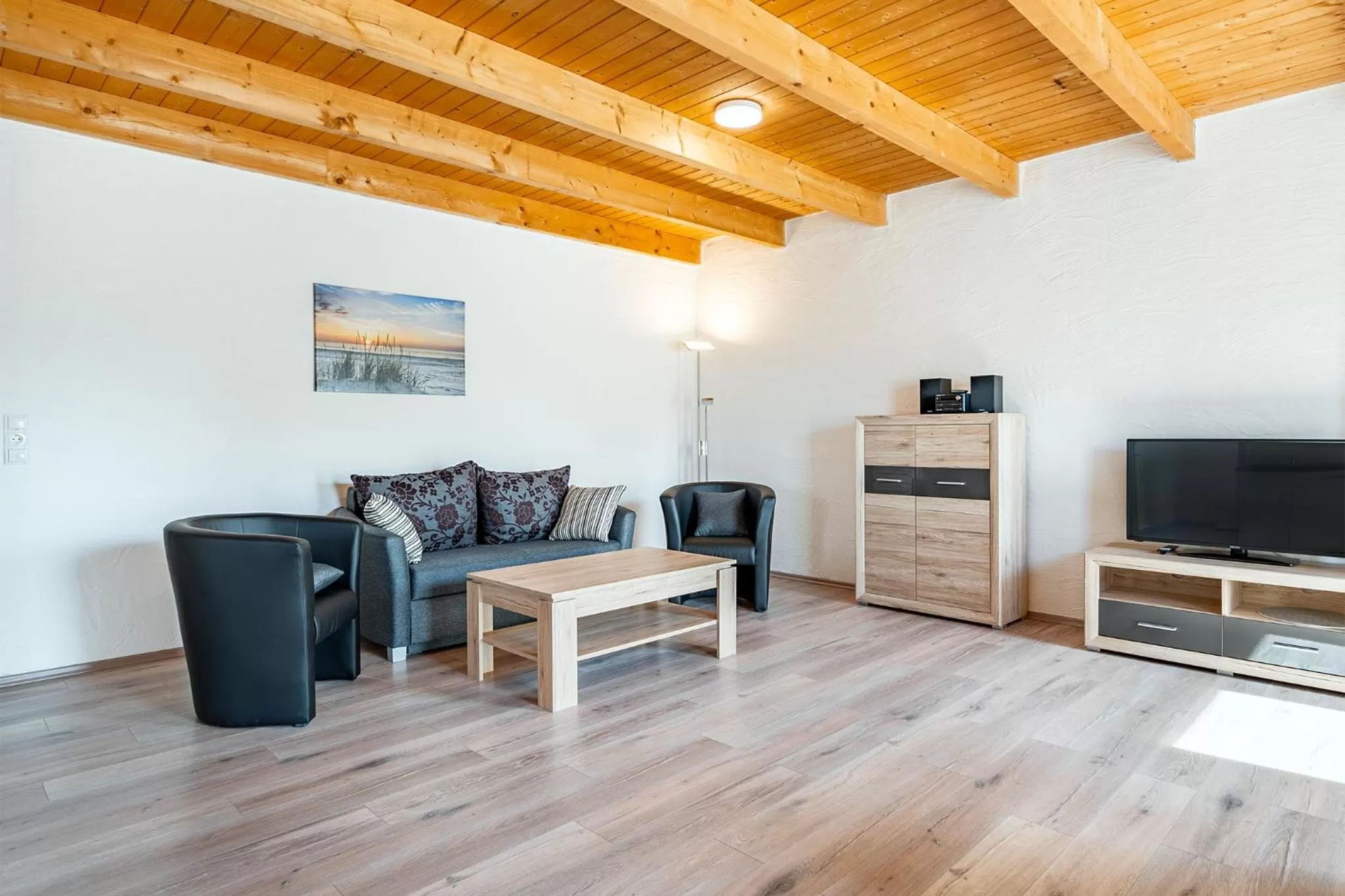 Communal lounge/ TV room in Villa Moorstern am Badesee Tannenhausen