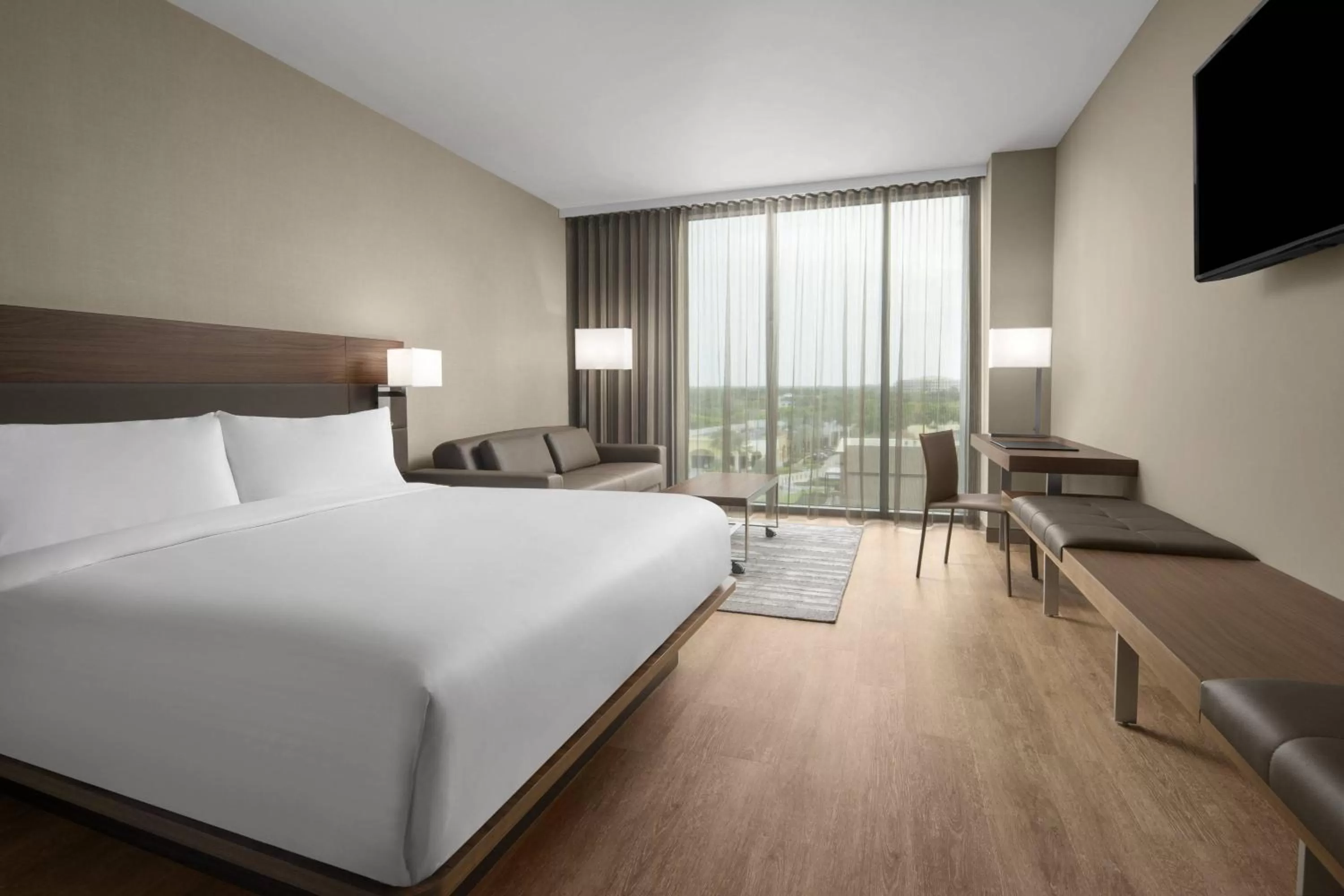 Photo of the whole room, Bed in AC Hotel by Marriott Fort Lauderdale Sawgrass Mills Sunrise