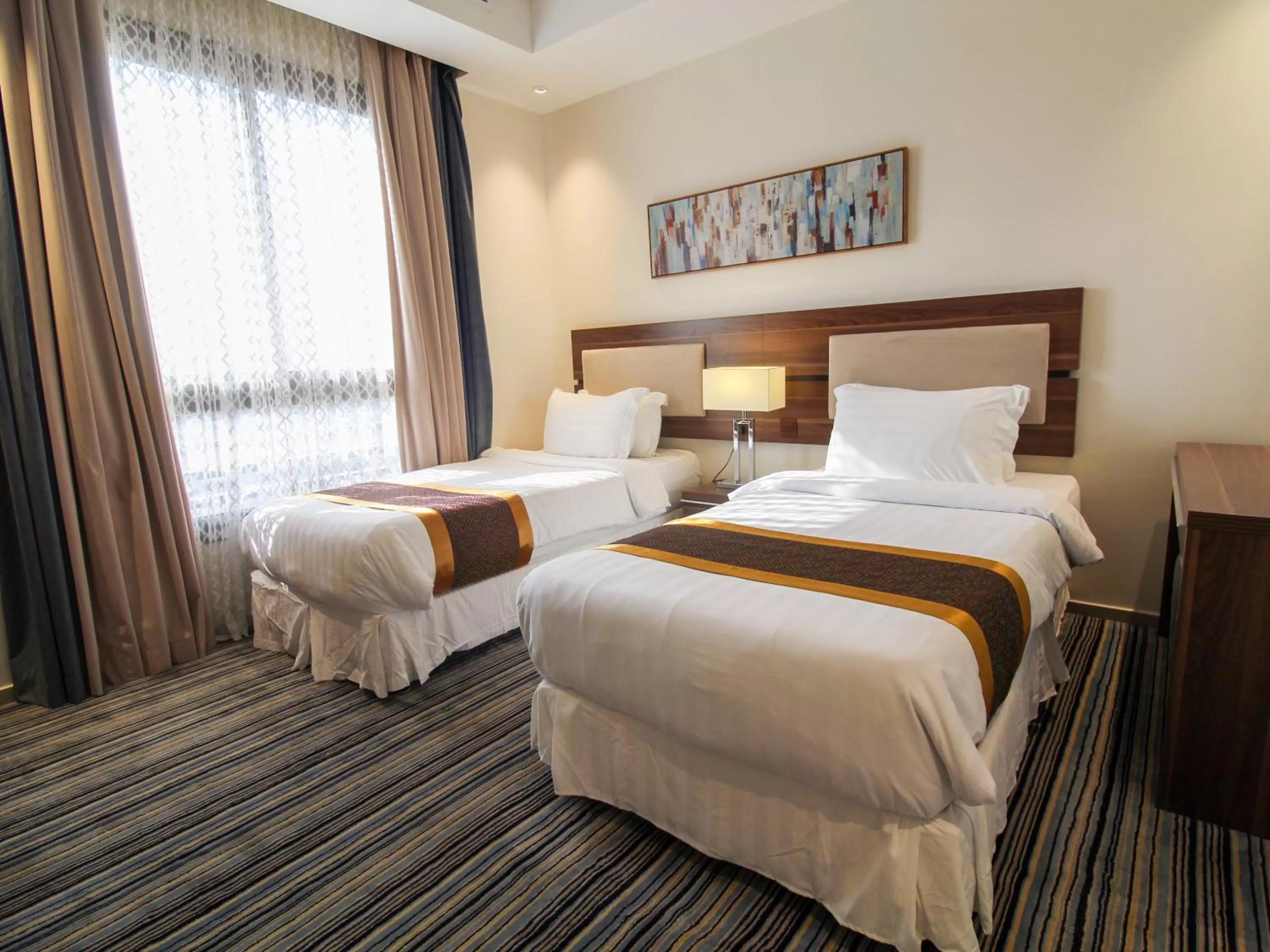 Bed in Friesian Hotel Suites