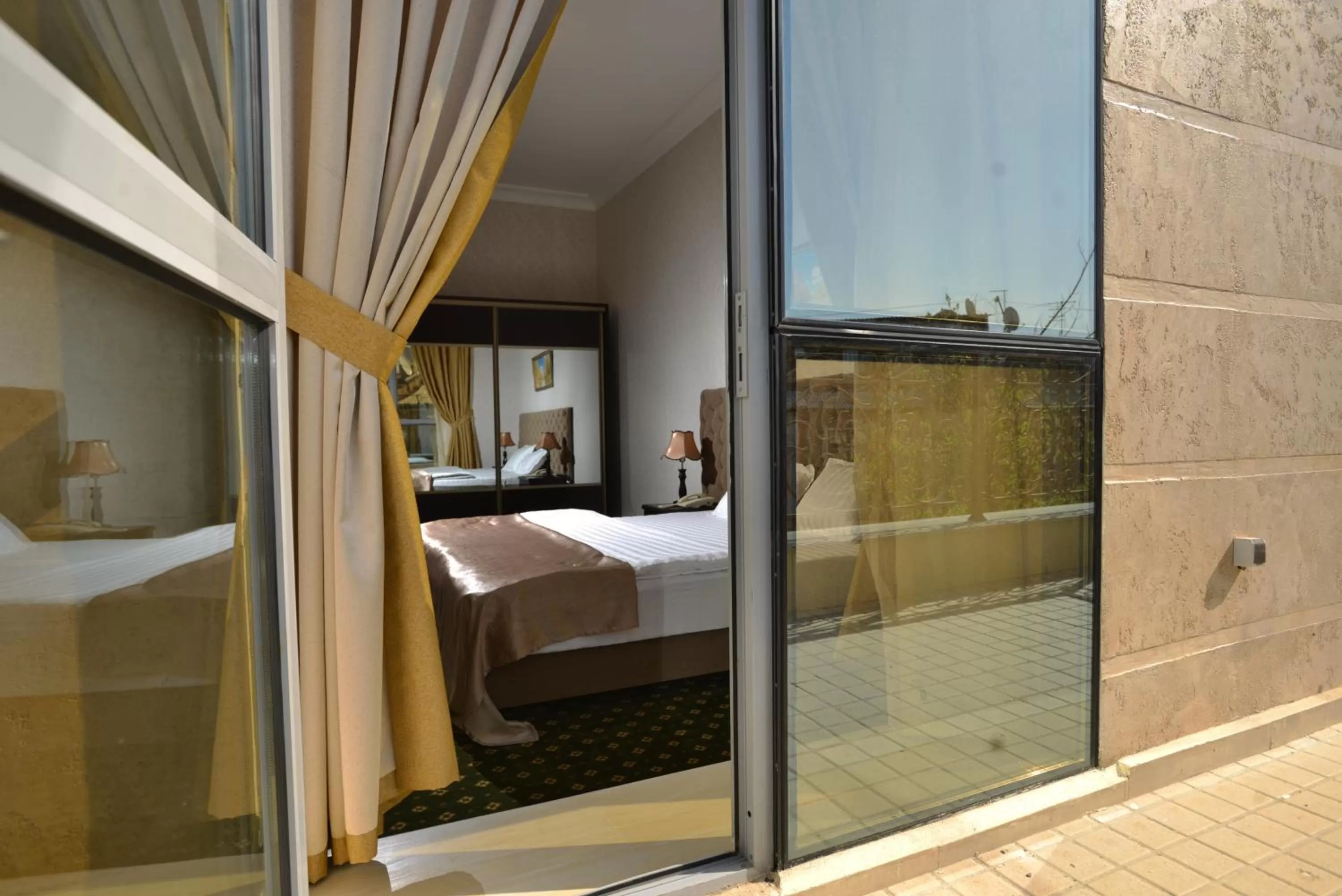 Balcony/Terrace, Bed in Gloria Hotel