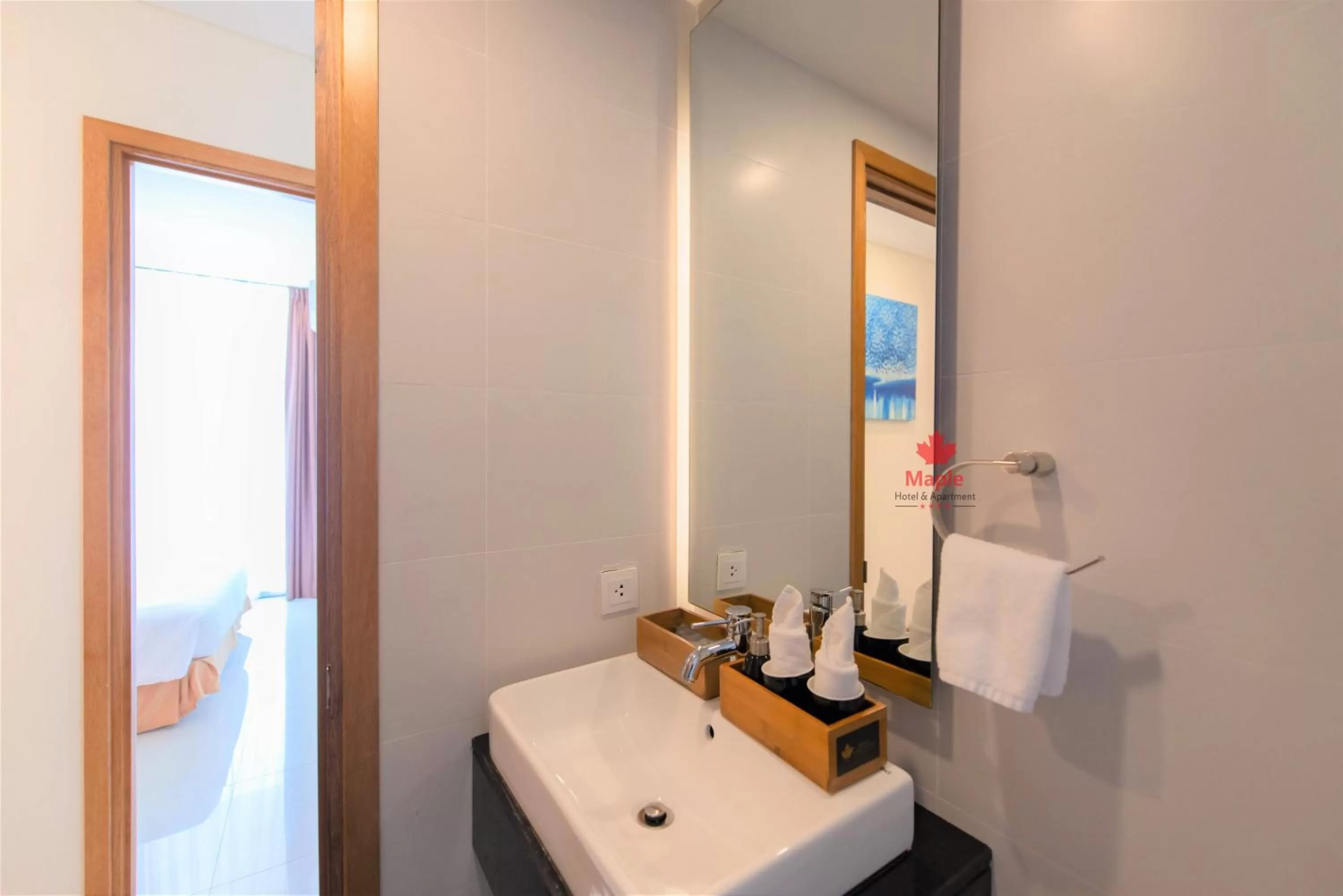 Toilet in Maple Hotel & Apartment