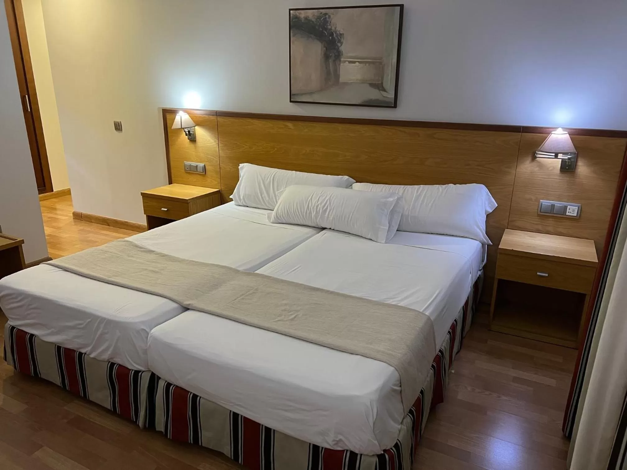 Bedroom, Bed in Alojamientos Cervantes