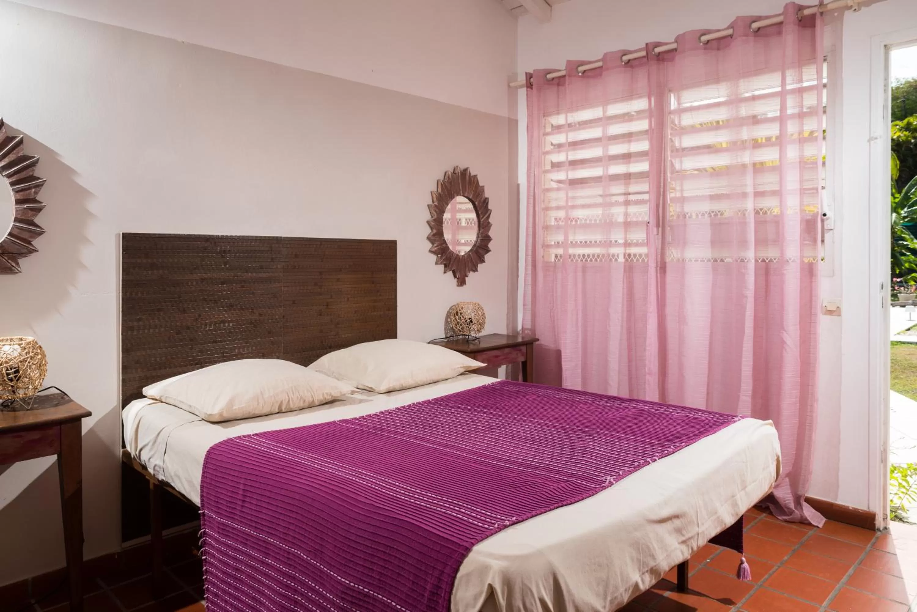 Bed in Hôtel Les Bananiers