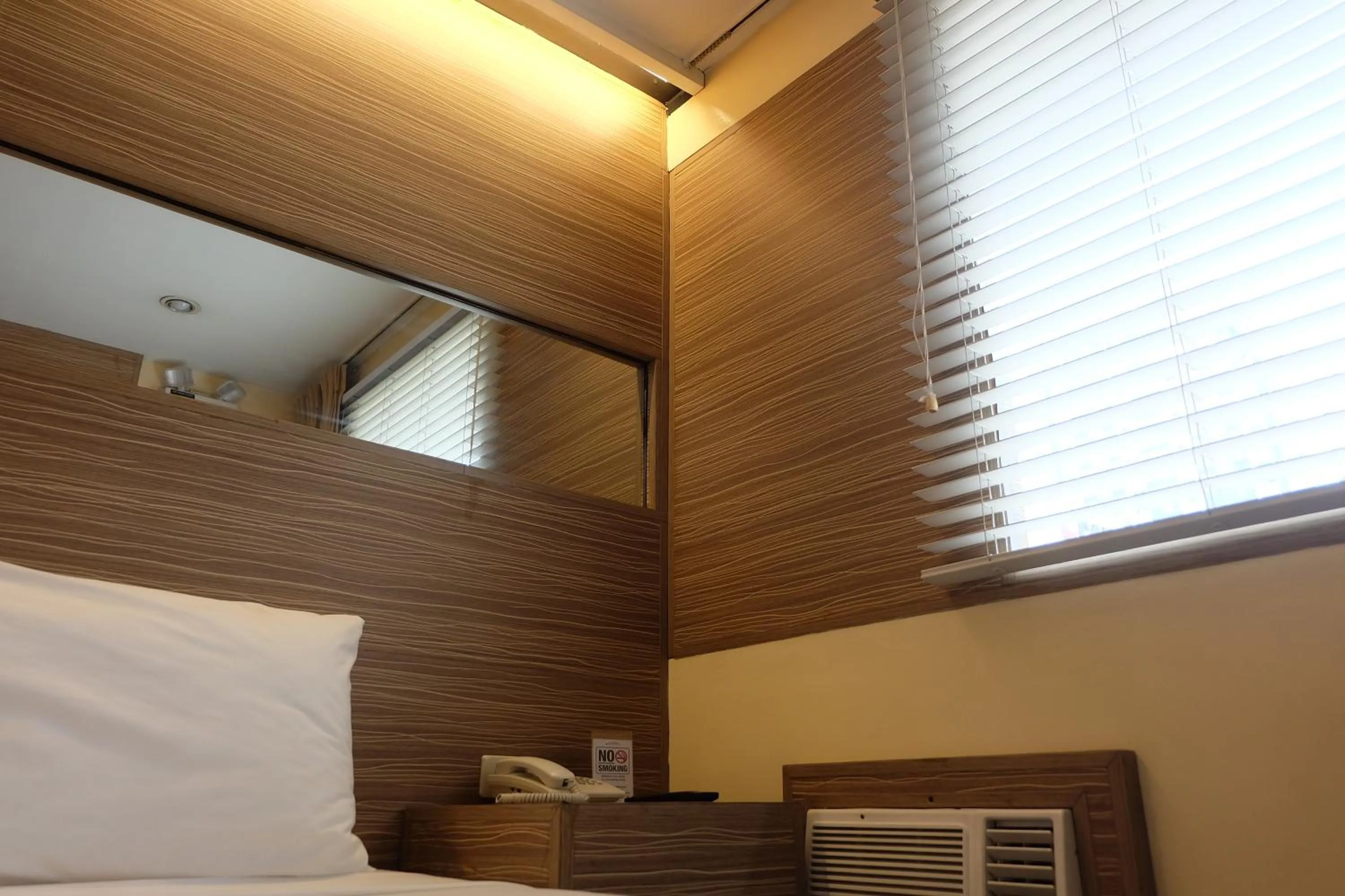 Bedroom, Bed in Spaces Hotel Makati