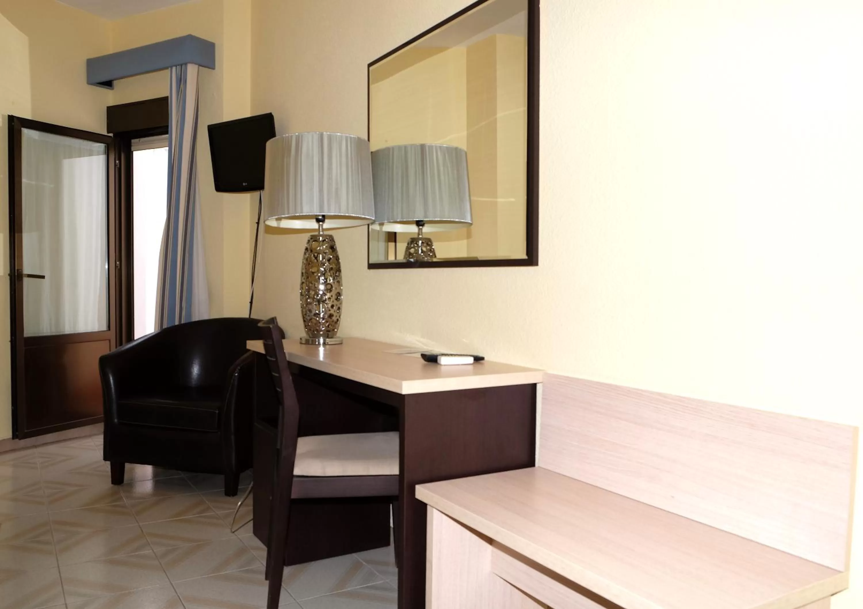 Decorative detail, TV/Entertainment Center in Hotel Oasis Familiar