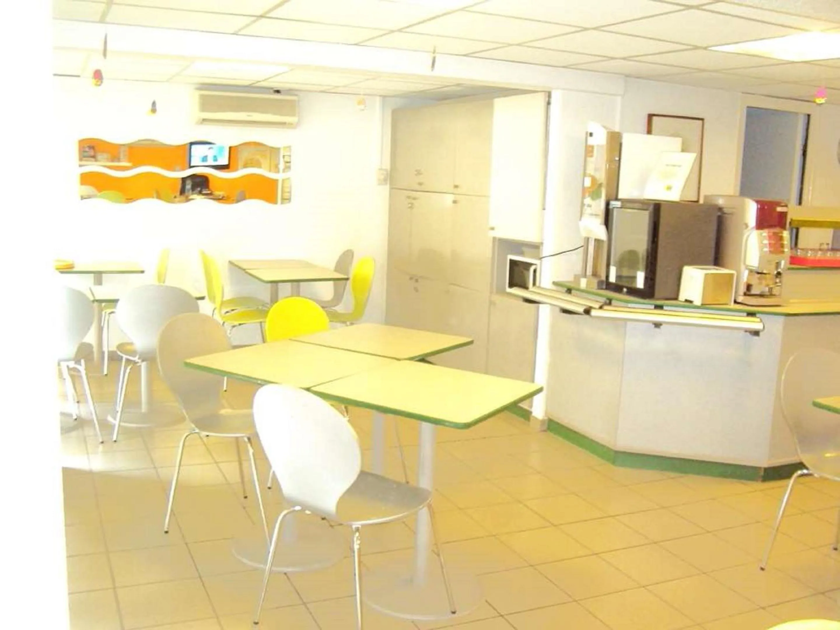 Lobby or reception in Premiere Classe St Etienne Nord Villars