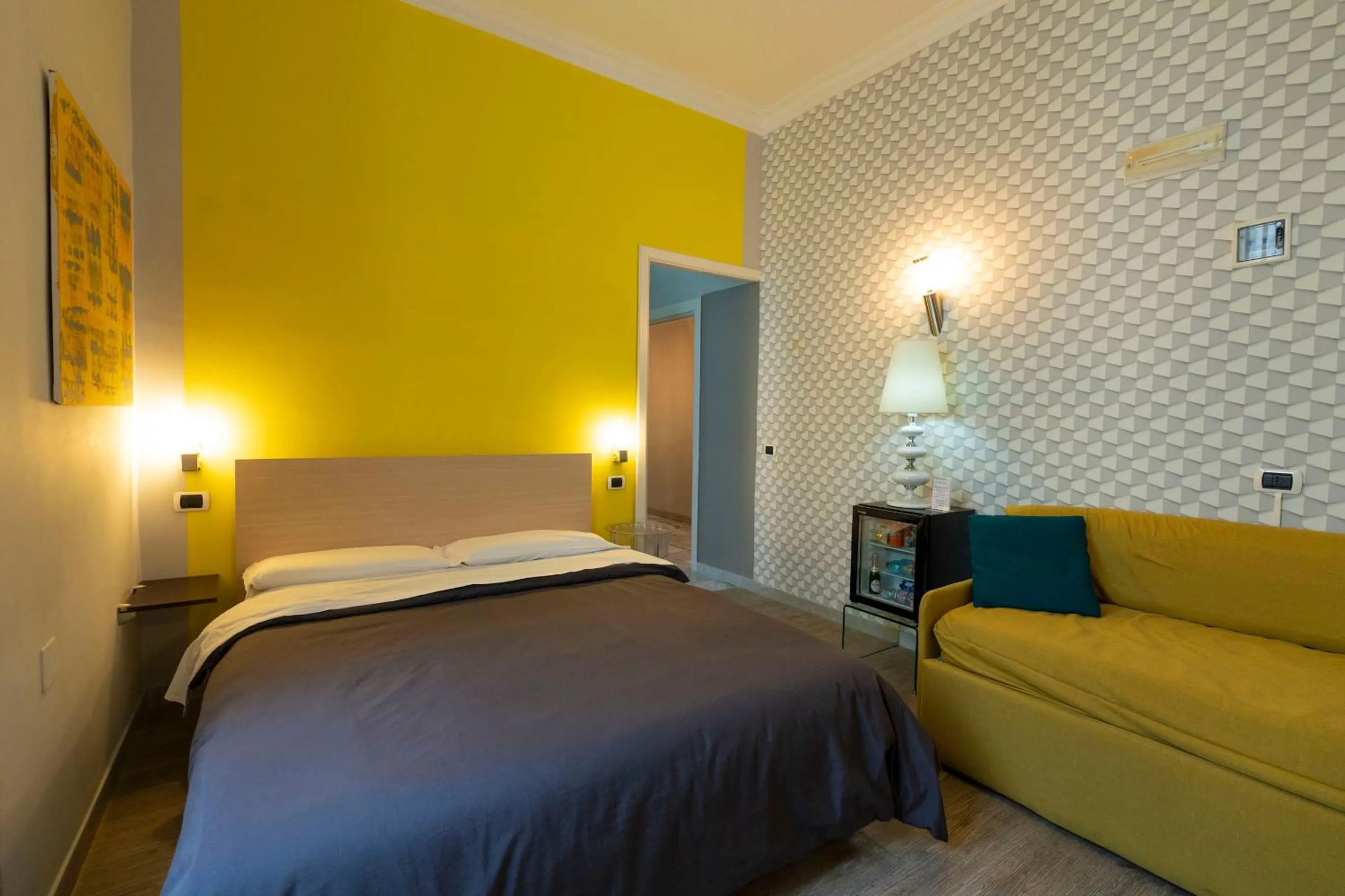 Bed in H Rooms boutique Hotel