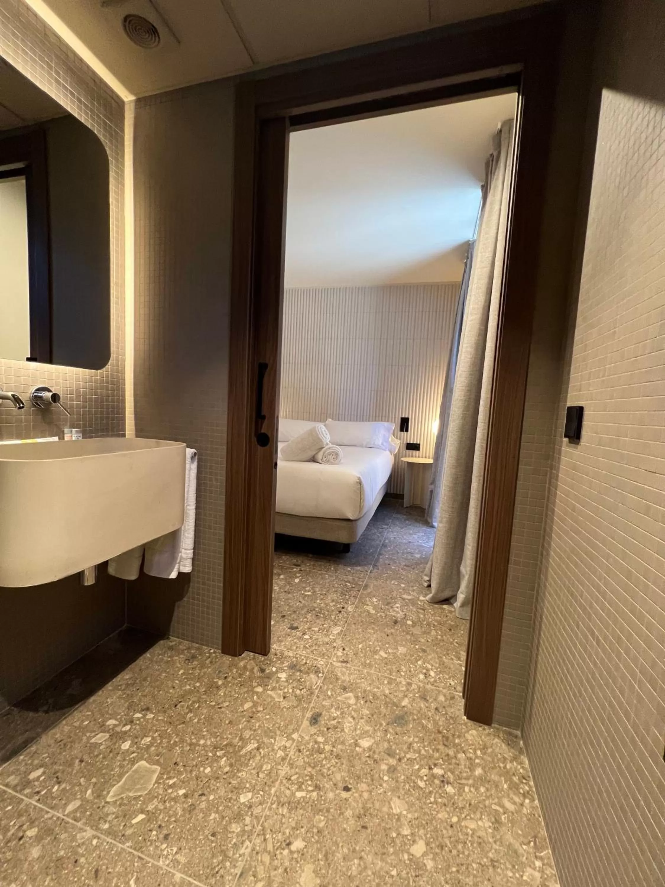 Bed in CIM HOTEL BOUTIQUE