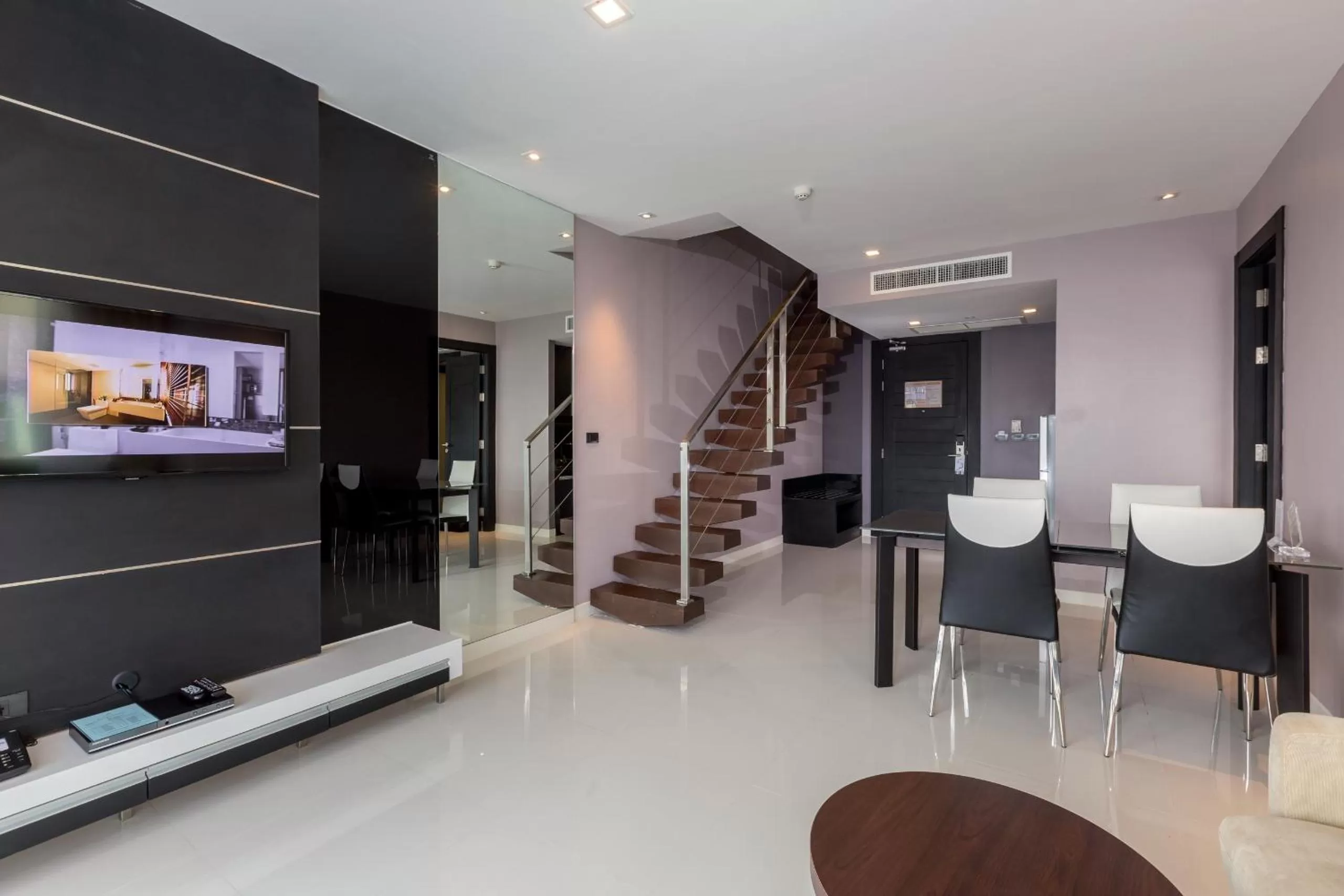 Living room in The Charm Resort Phuket - SHA Certified