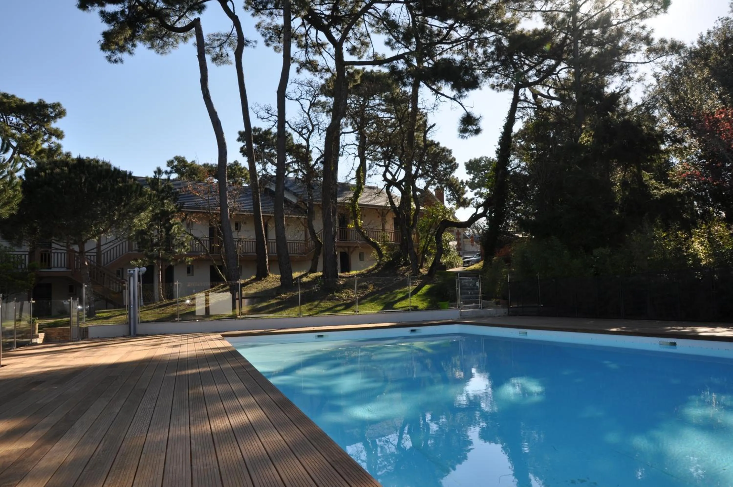 Swimming pool in Hôtel The Originals Résidence de Rohan (EX RELAIS DU SILENCE)