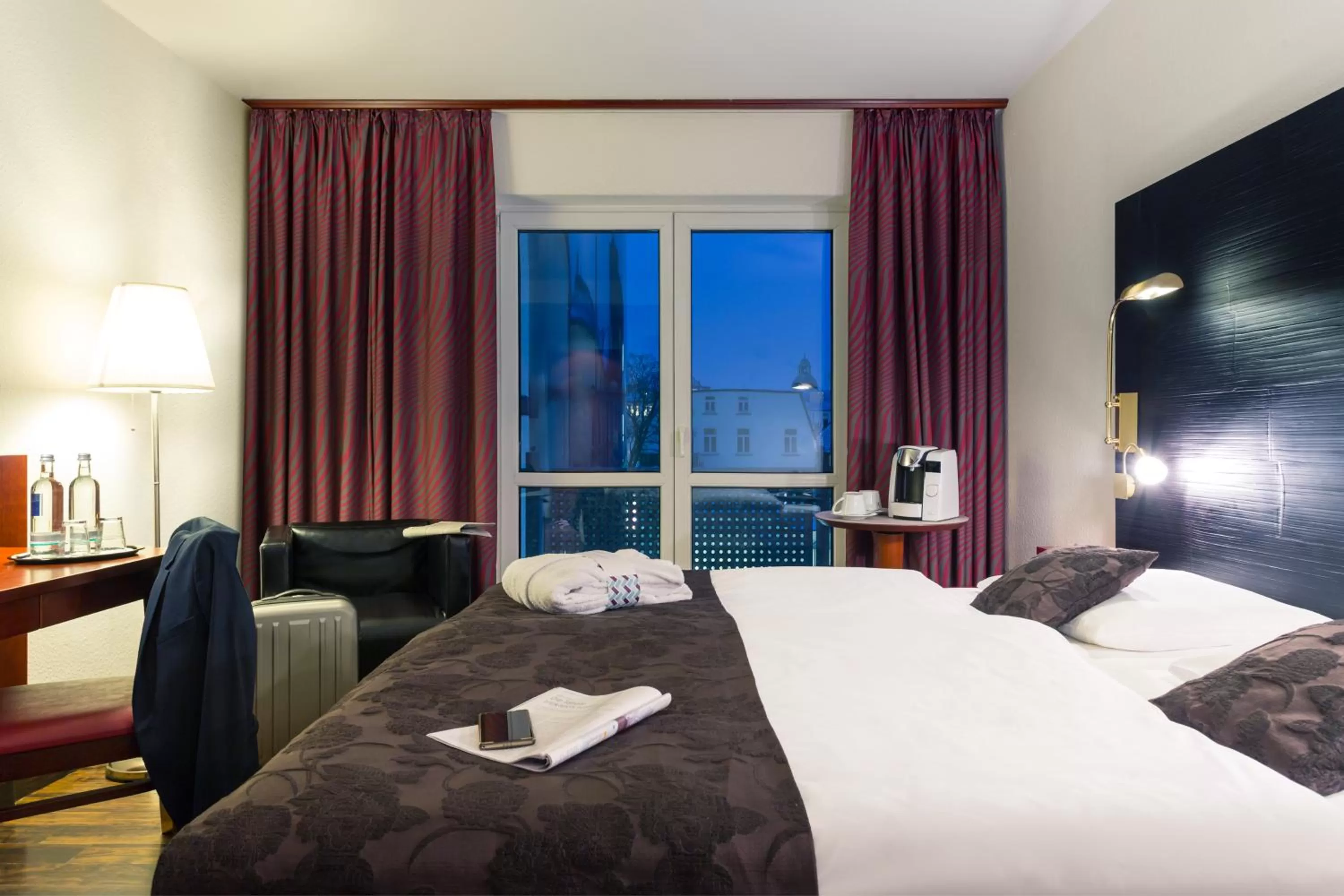 Photo of the whole room, Bed in Mercure Hotel Bad Oeynhausen City